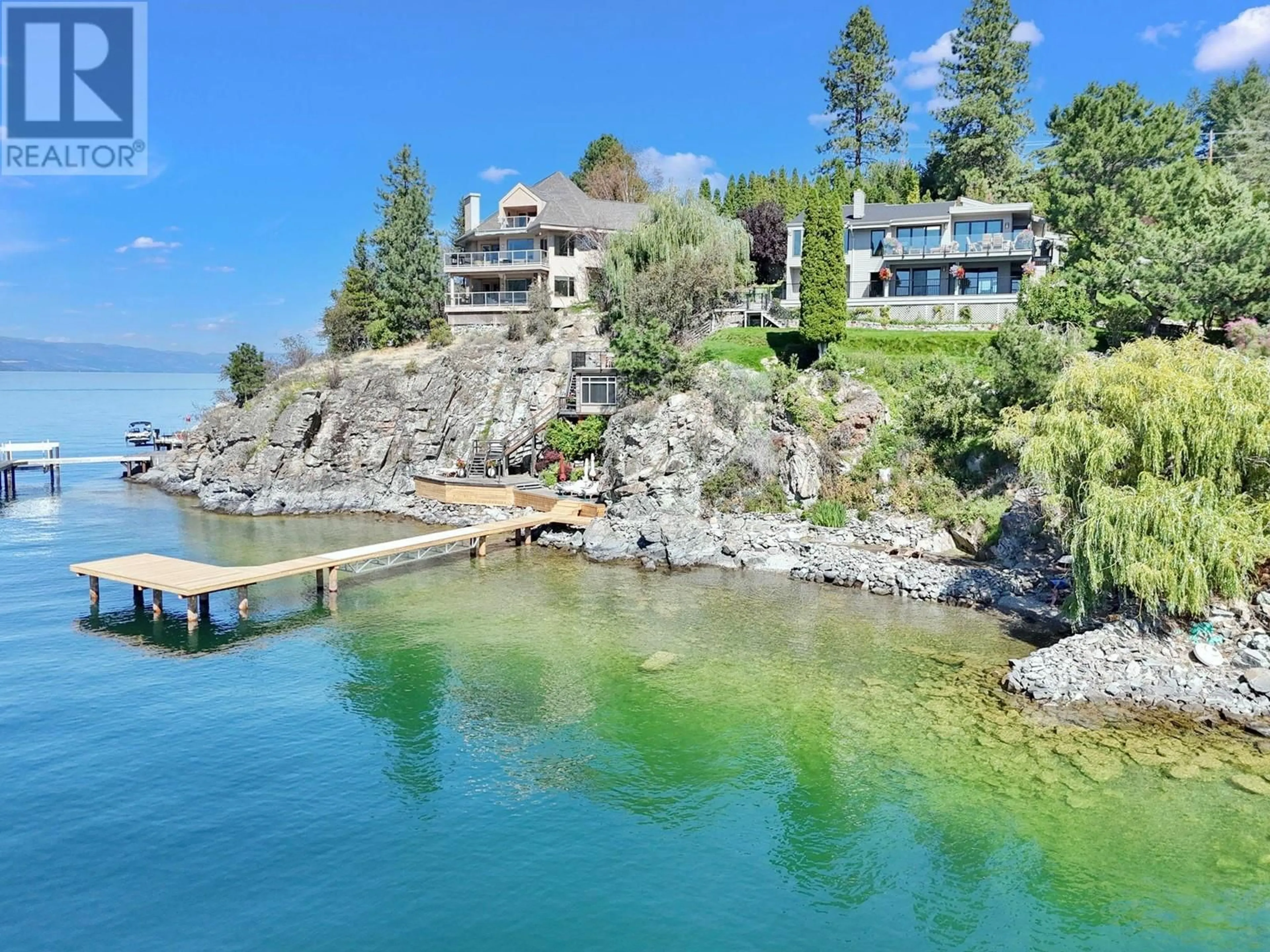 A pic from outside/outdoor area/front of a property/back of a property/a pic from drone, water/lake/river/ocean view for 2052 Dewdney Road, Kelowna British Columbia V1V2C3