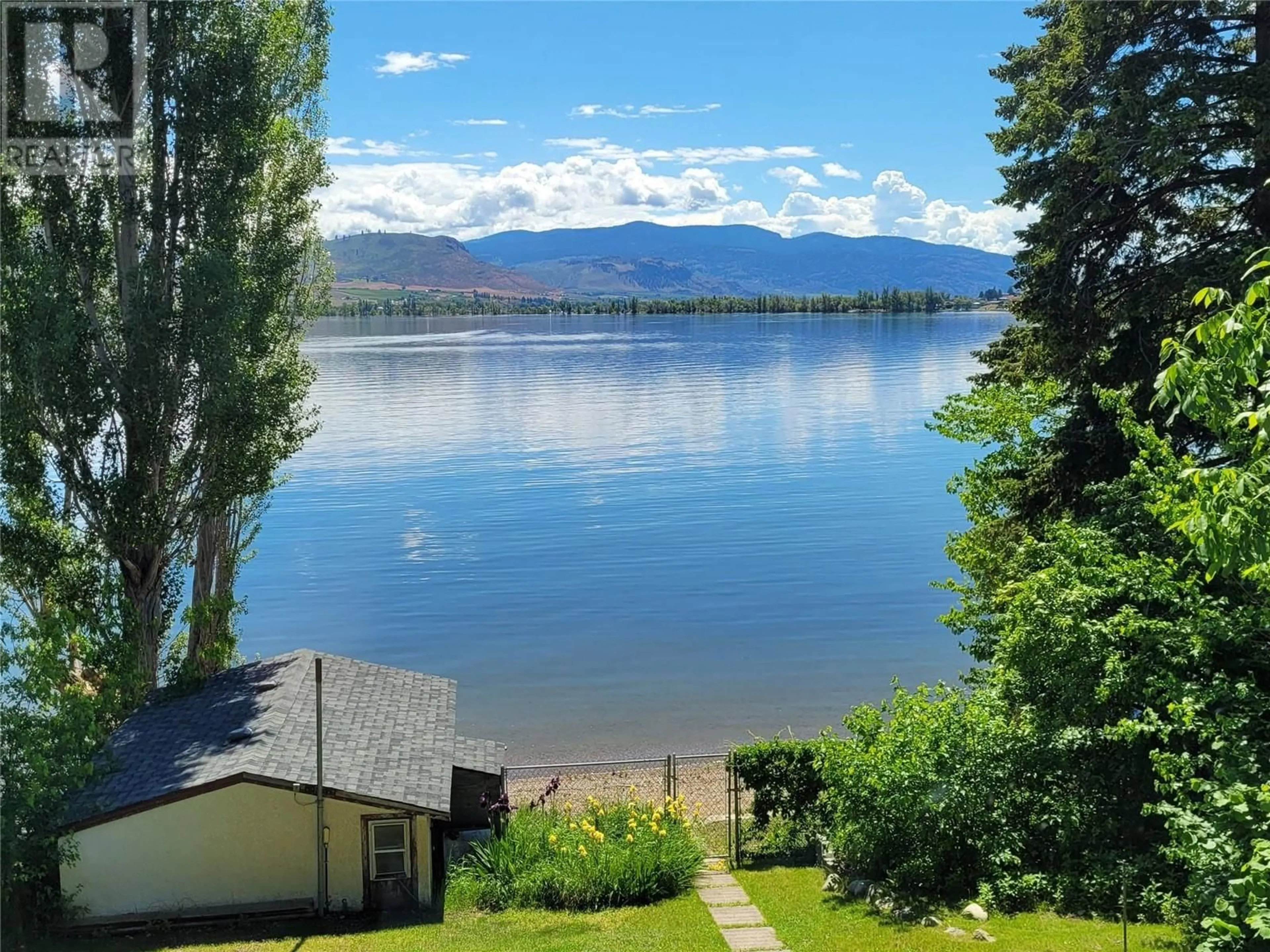 A pic from outside/outdoor area/front of a property/back of a property/a pic from drone, water/lake/river/ocean view for 8503 Kingfisher Drive, Osoyoos British Columbia V0H1V1