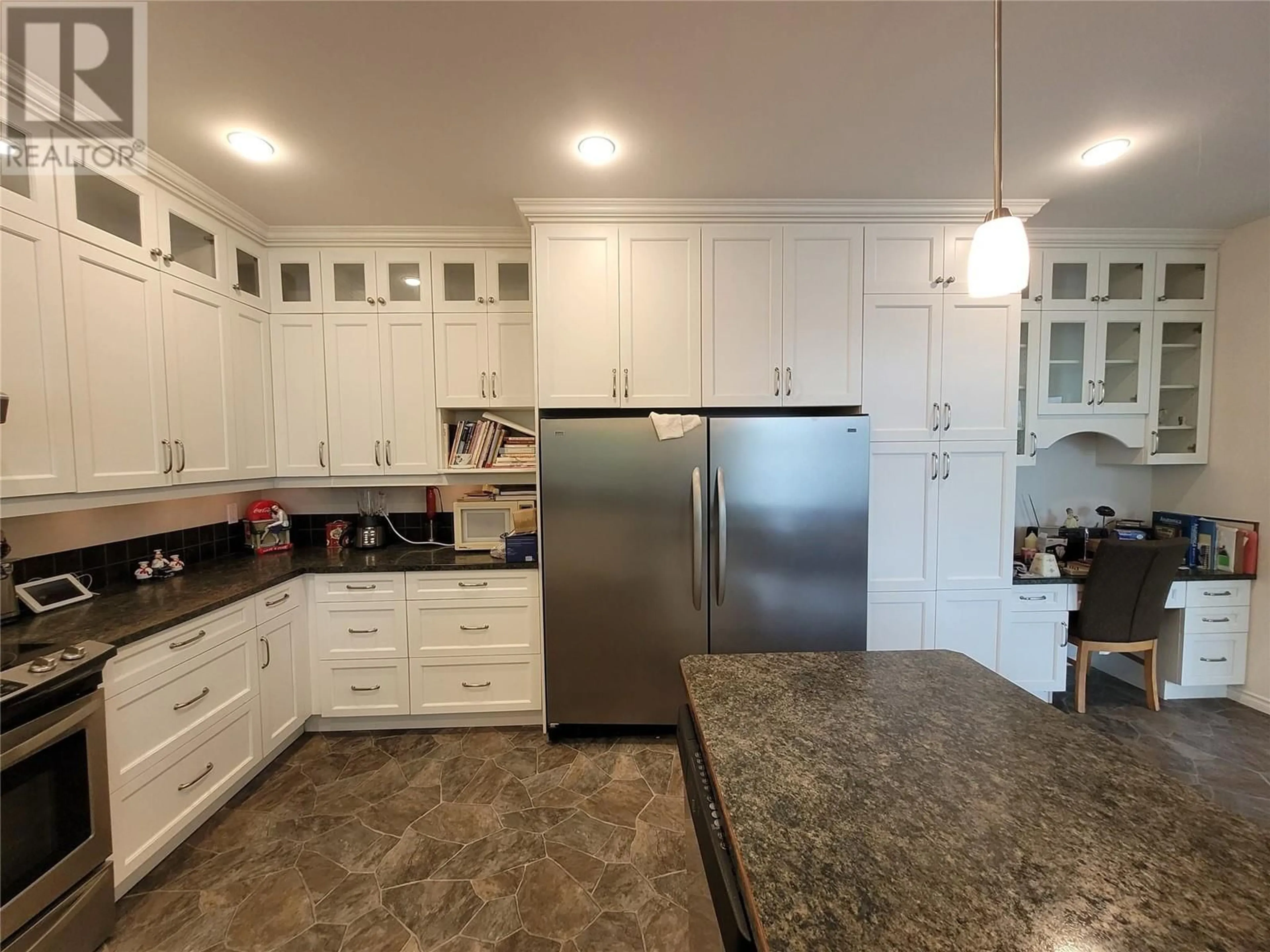 Open concept kitchen, ceramic/tile floor for 8503 Kingfisher Drive, Osoyoos British Columbia V0H1V1