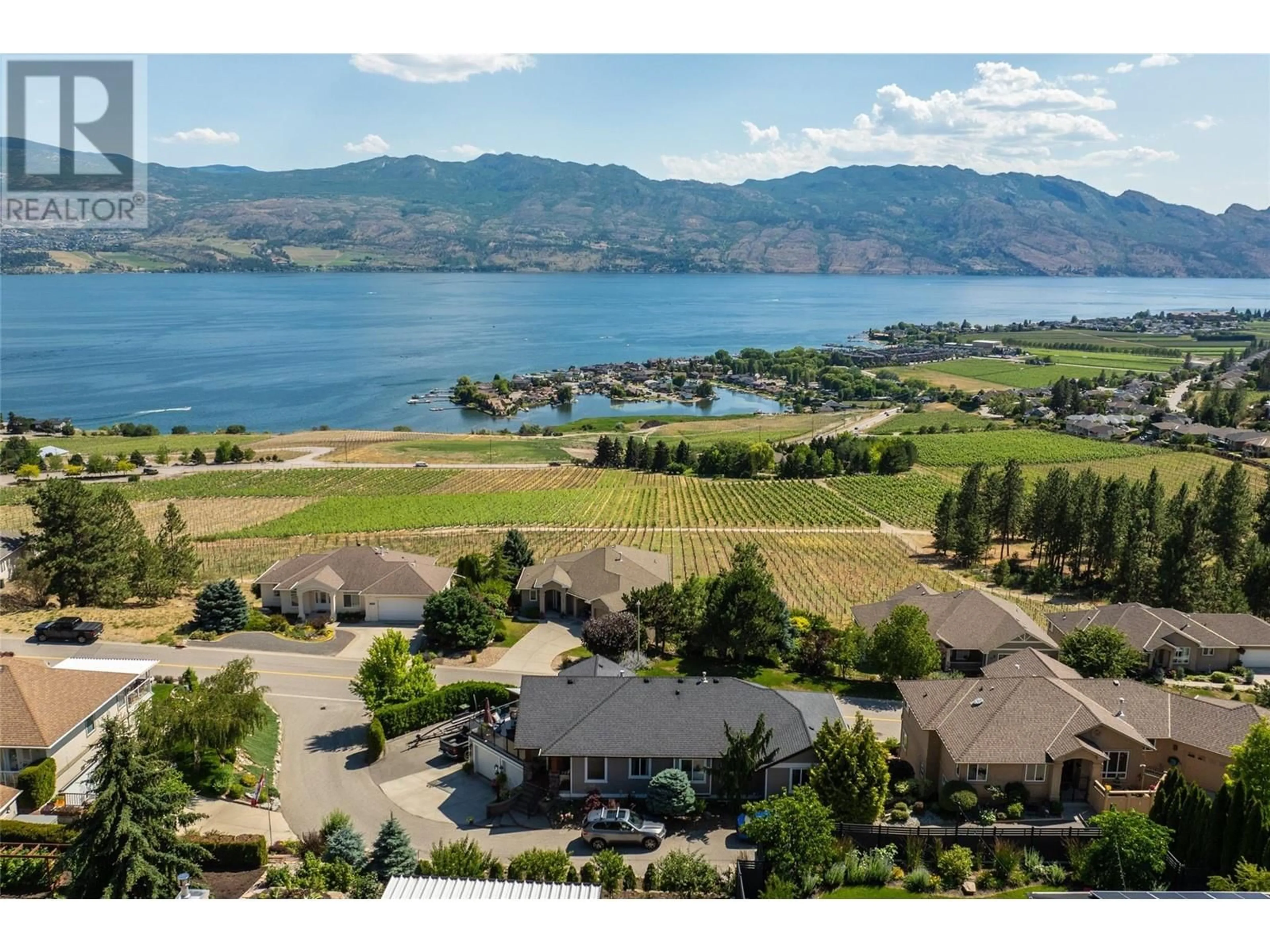 A pic from outside/outdoor area/front of a property/back of a property/a pic from drone, water/lake/river/ocean view for 1368 Gregory Road, West Kelowna British Columbia V1Z3P2