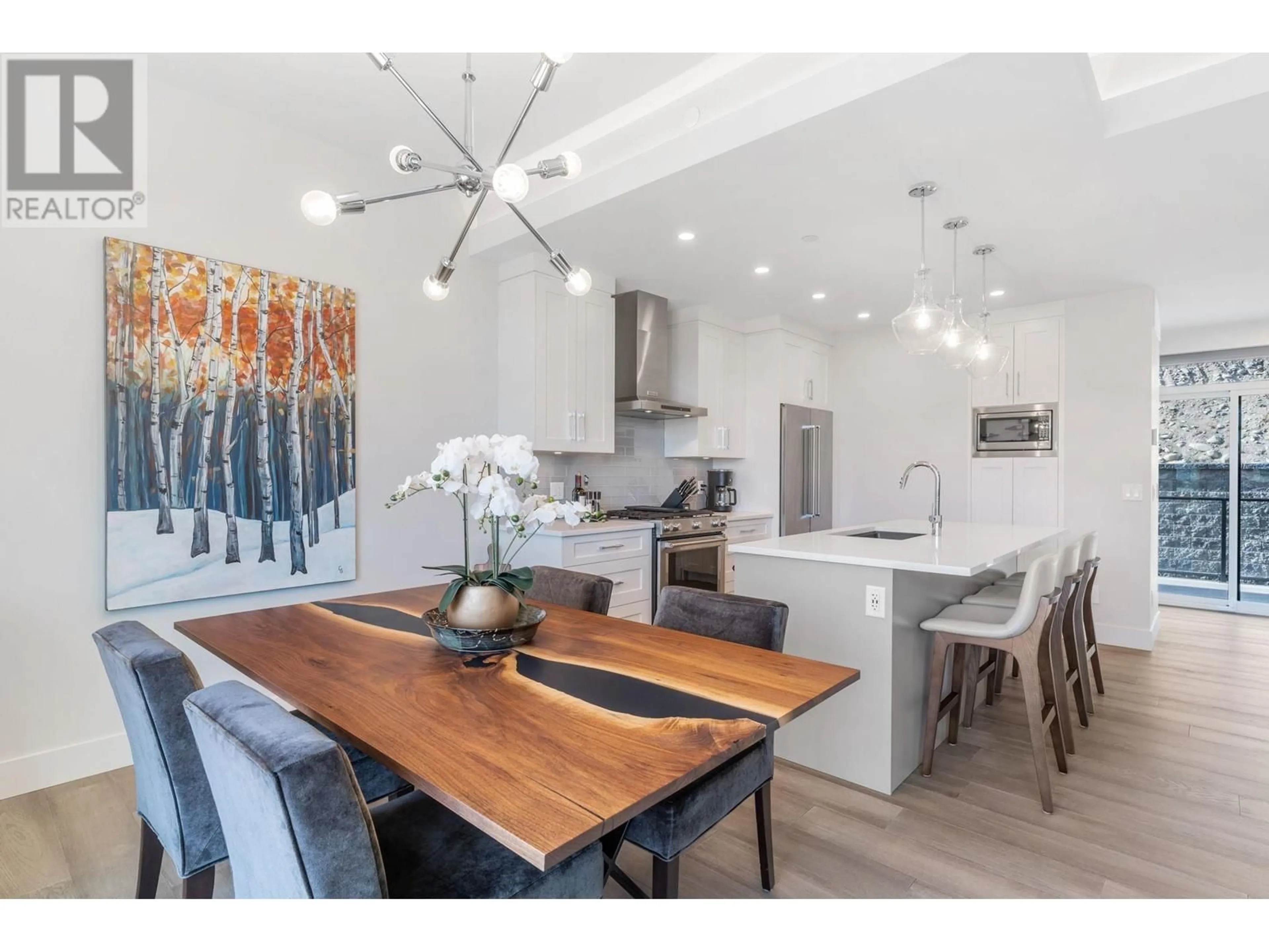 Open concept kitchen, wood/laminate floor for 5996 PRINCESS STREET, Peachland British Columbia V0H1X7