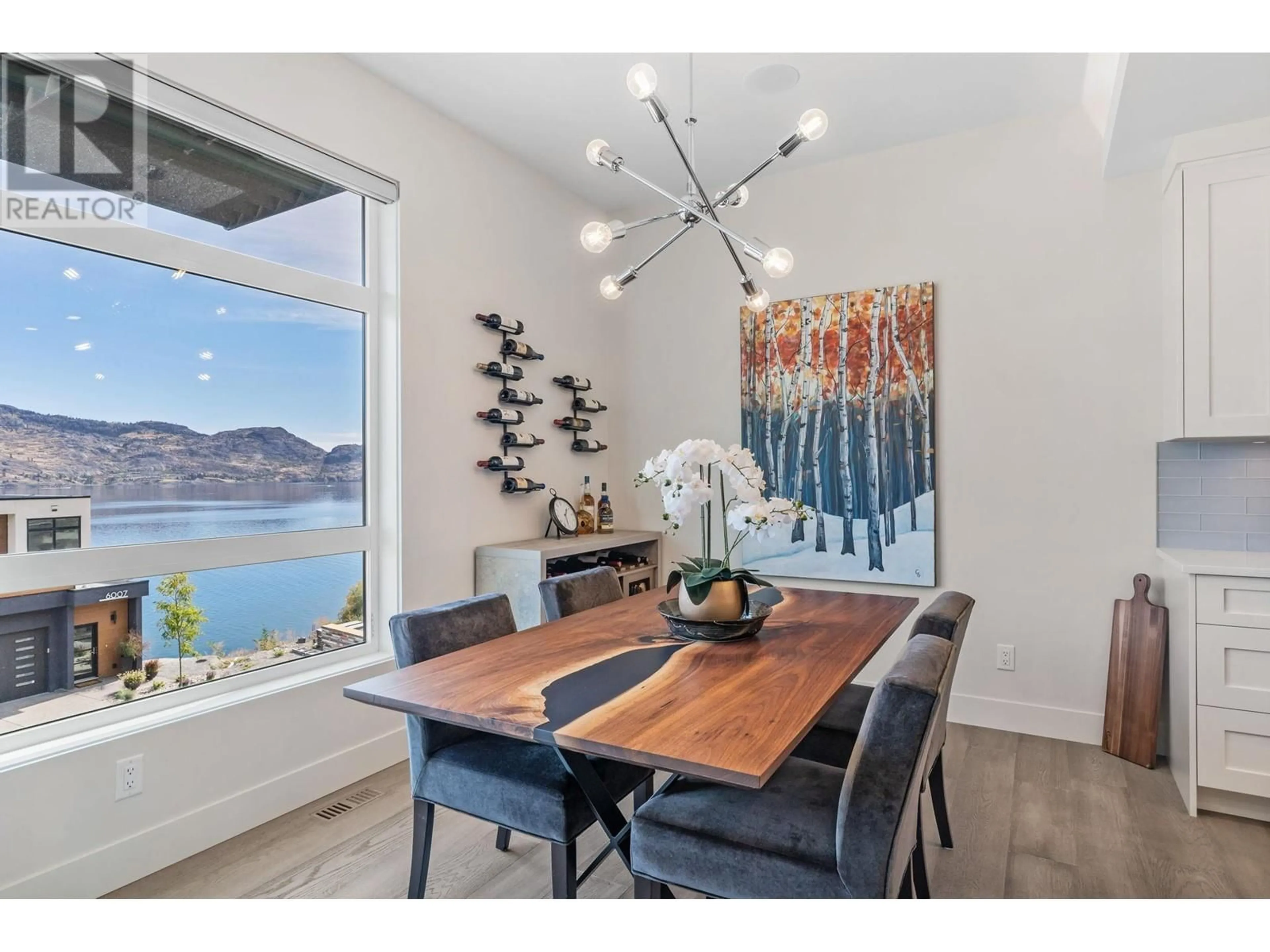 Dining room, wood/laminate floor for 5996 Princess Street, Peachland British Columbia V0H1X7