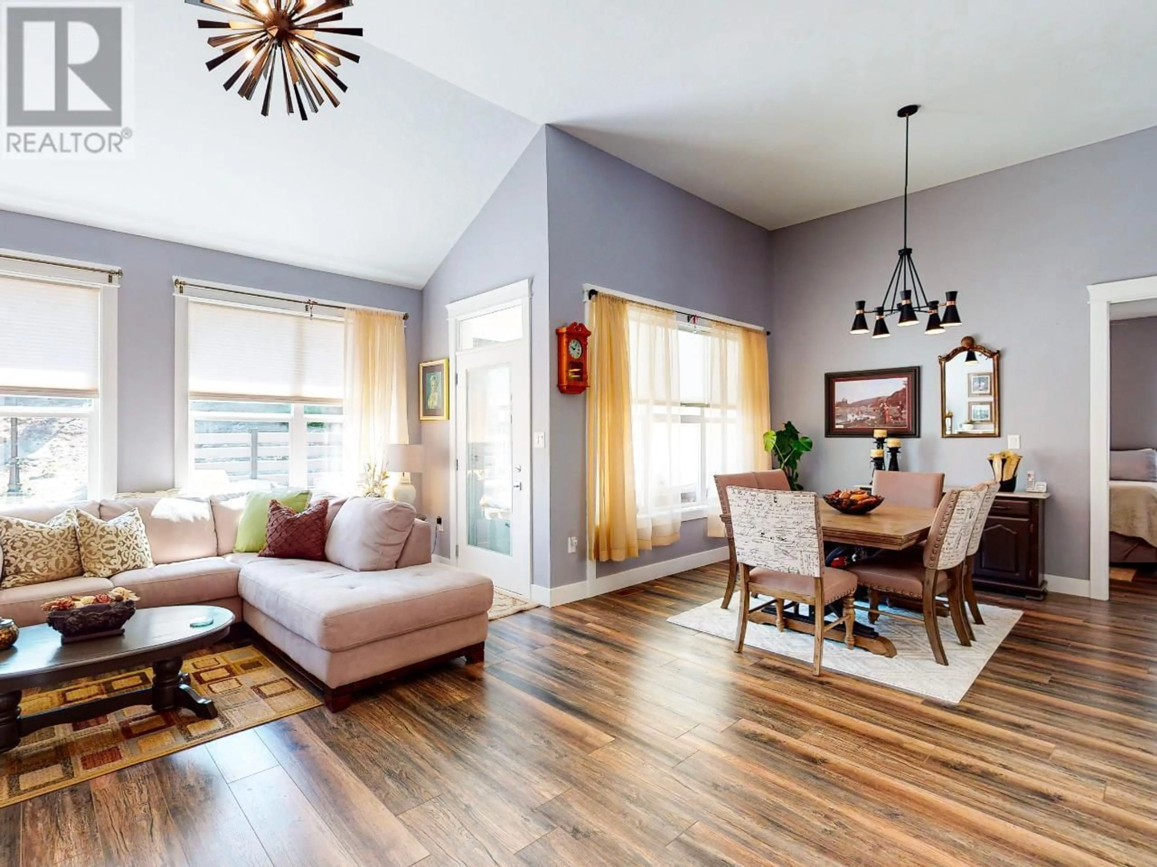 Living room with furniture, wood/laminate floor for 3807 Fairwinds Drive, Osoyoos British Columbia V0H1V4