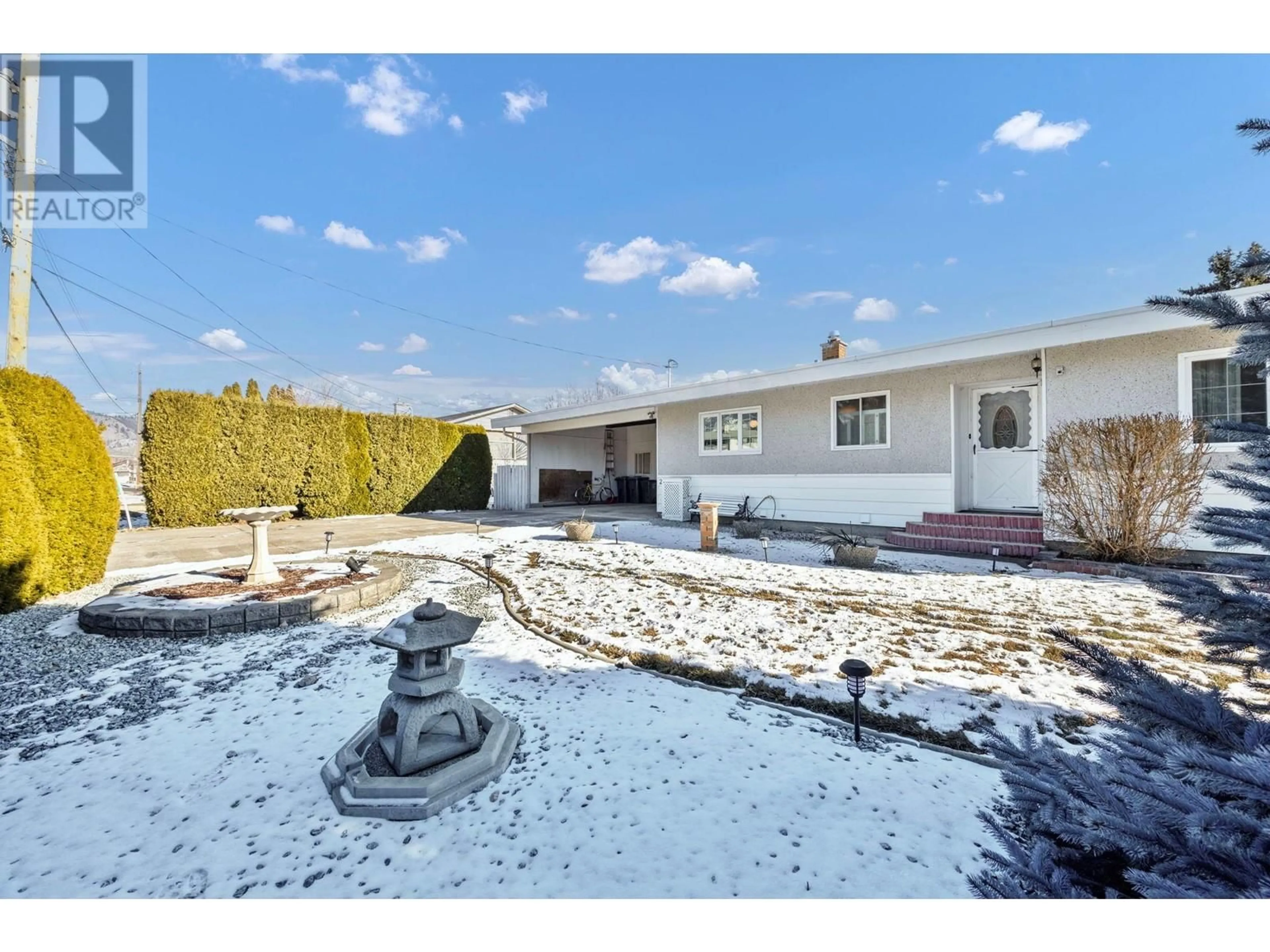 A pic from outside/outdoor area/front of a property/back of a property/a pic from drone, street for 2181 Peters Road, West Kelowna British Columbia V4T2C3