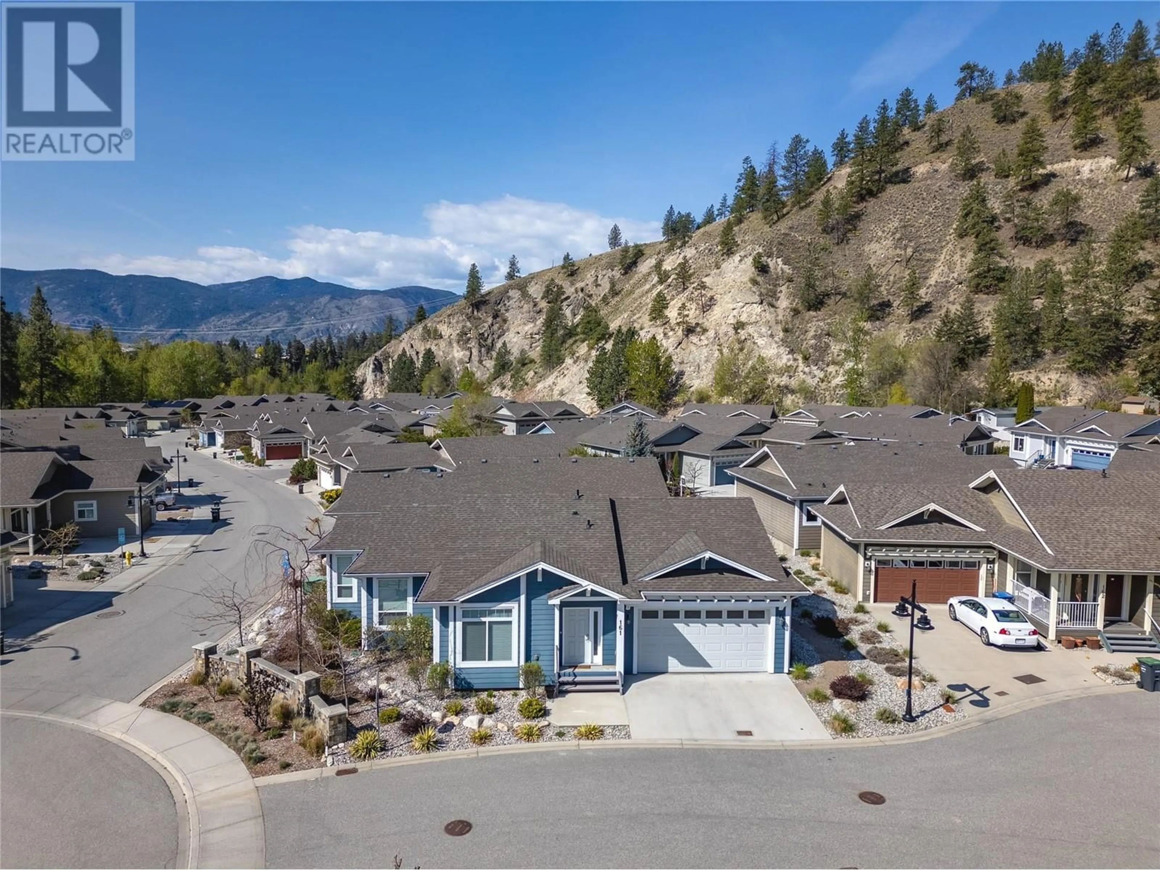 A pic from outside/outdoor area/front of a property/back of a property/a pic from drone, mountain view for 161 - 1675 PENTICTON AVENUE, Penticton British Columbia V2A9E2