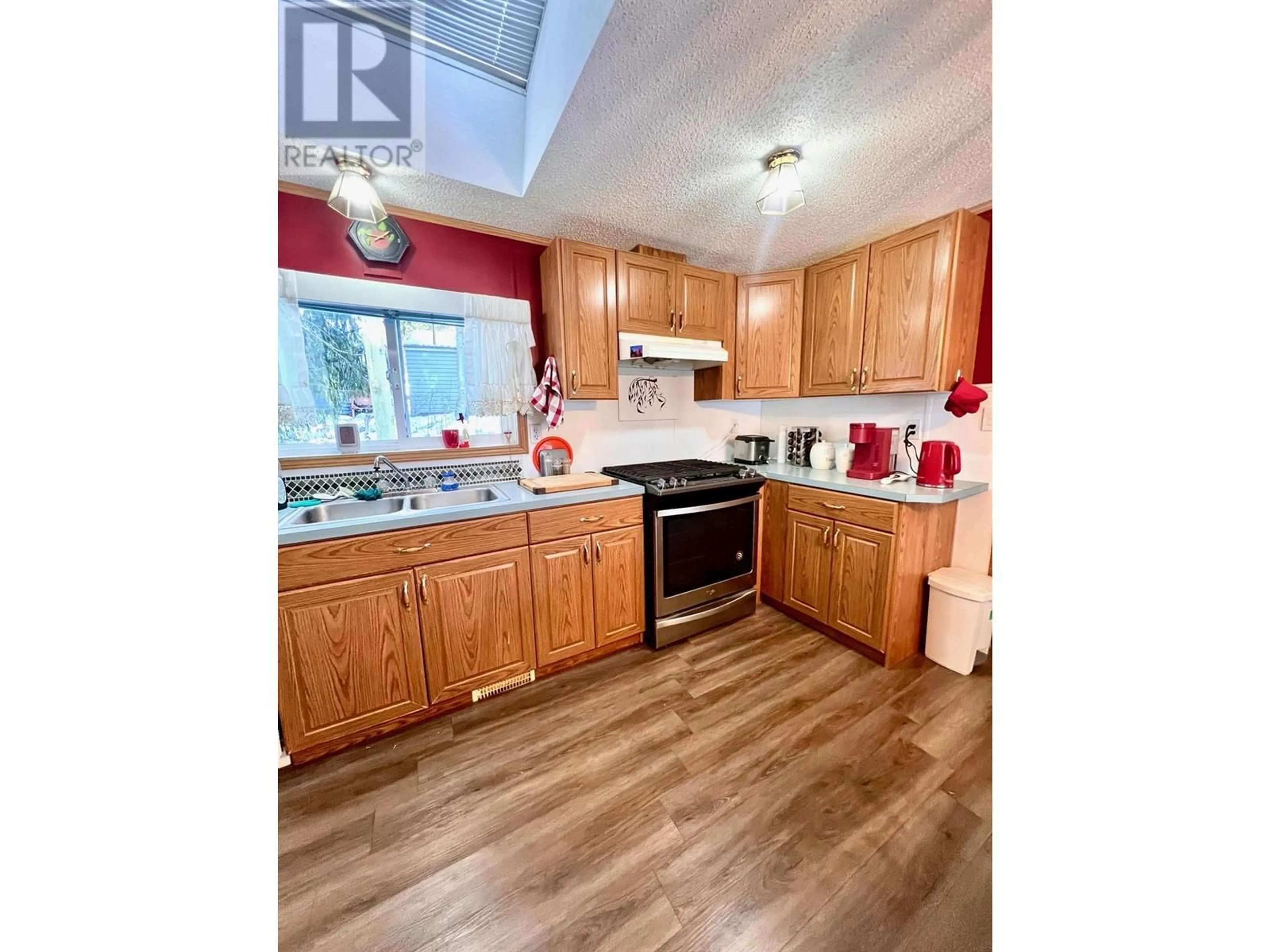 Standard kitchen, wood/laminate floor for 40 - 7126 HWY 3A OTHER, Nelson British Columbia V1L6S4