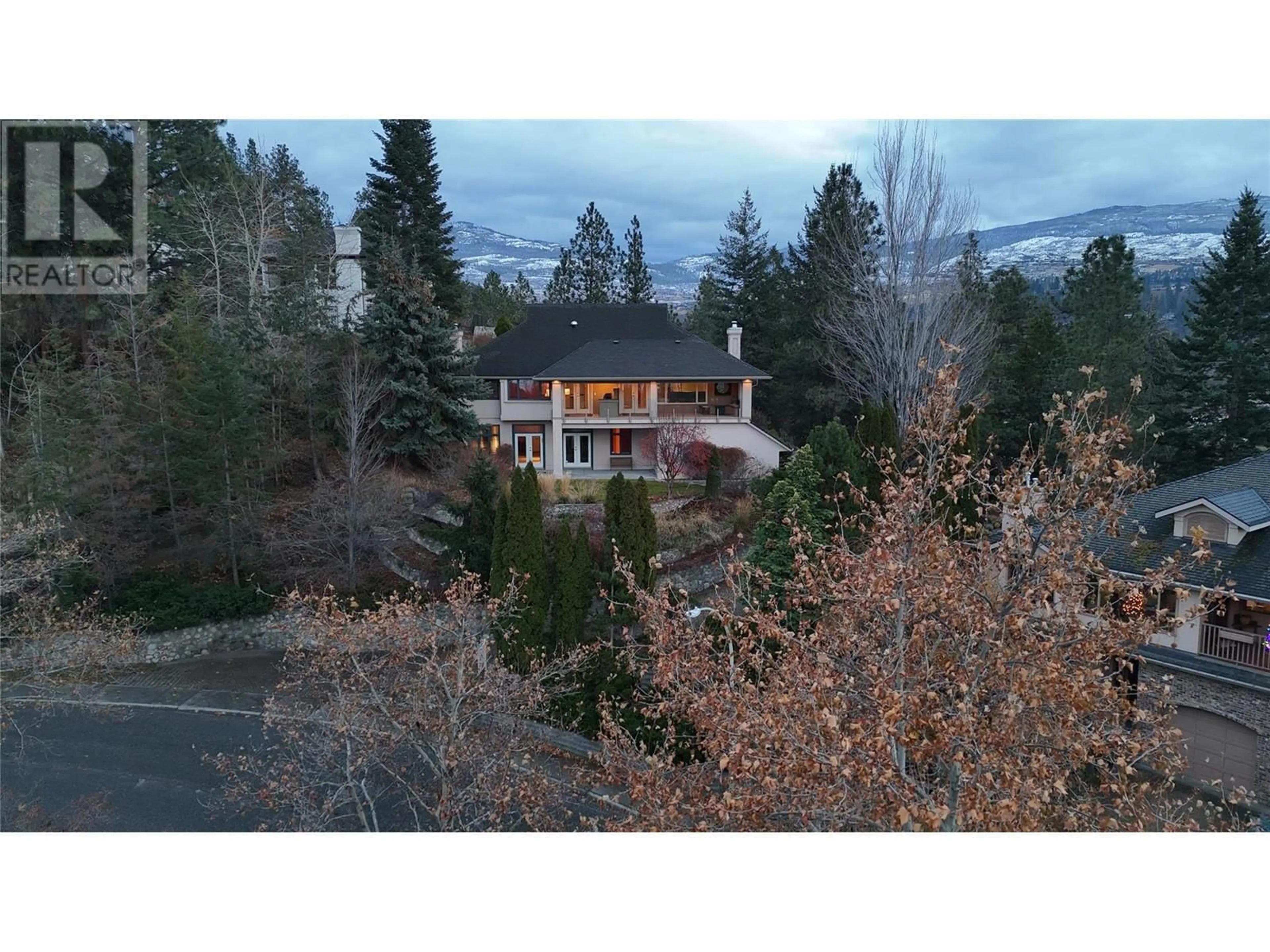 A pic from outside/outdoor area/front of a property/back of a property/a pic from drone, mountain view for 765 Westpoint Drive, Kelowna British Columbia V1W2Z4