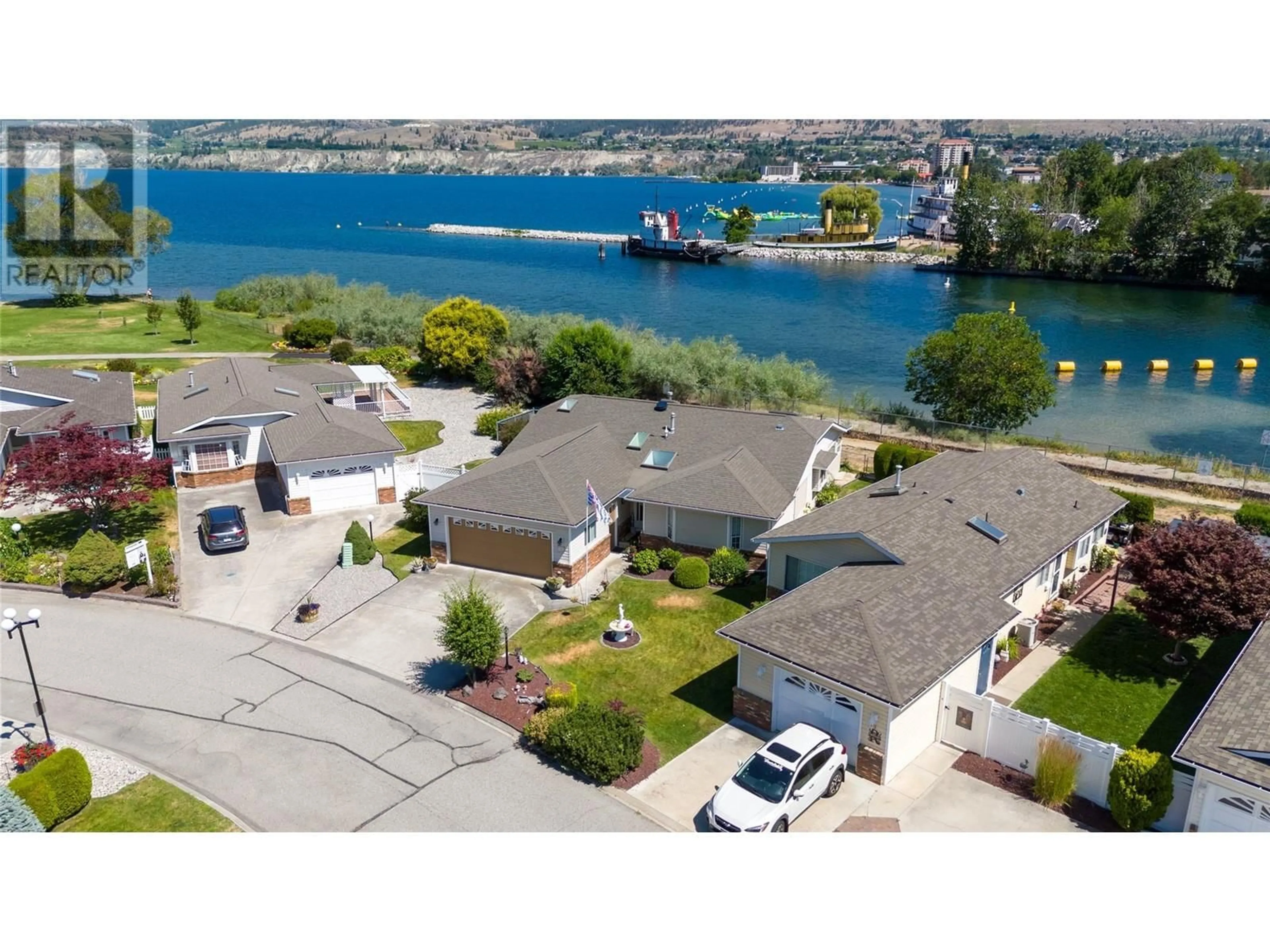 A pic from outside/outdoor area/front of a property/back of a property/a pic from drone, water/lake/river/ocean view for 43 Kingfisher Drive, Penticton British Columbia V2A8K6