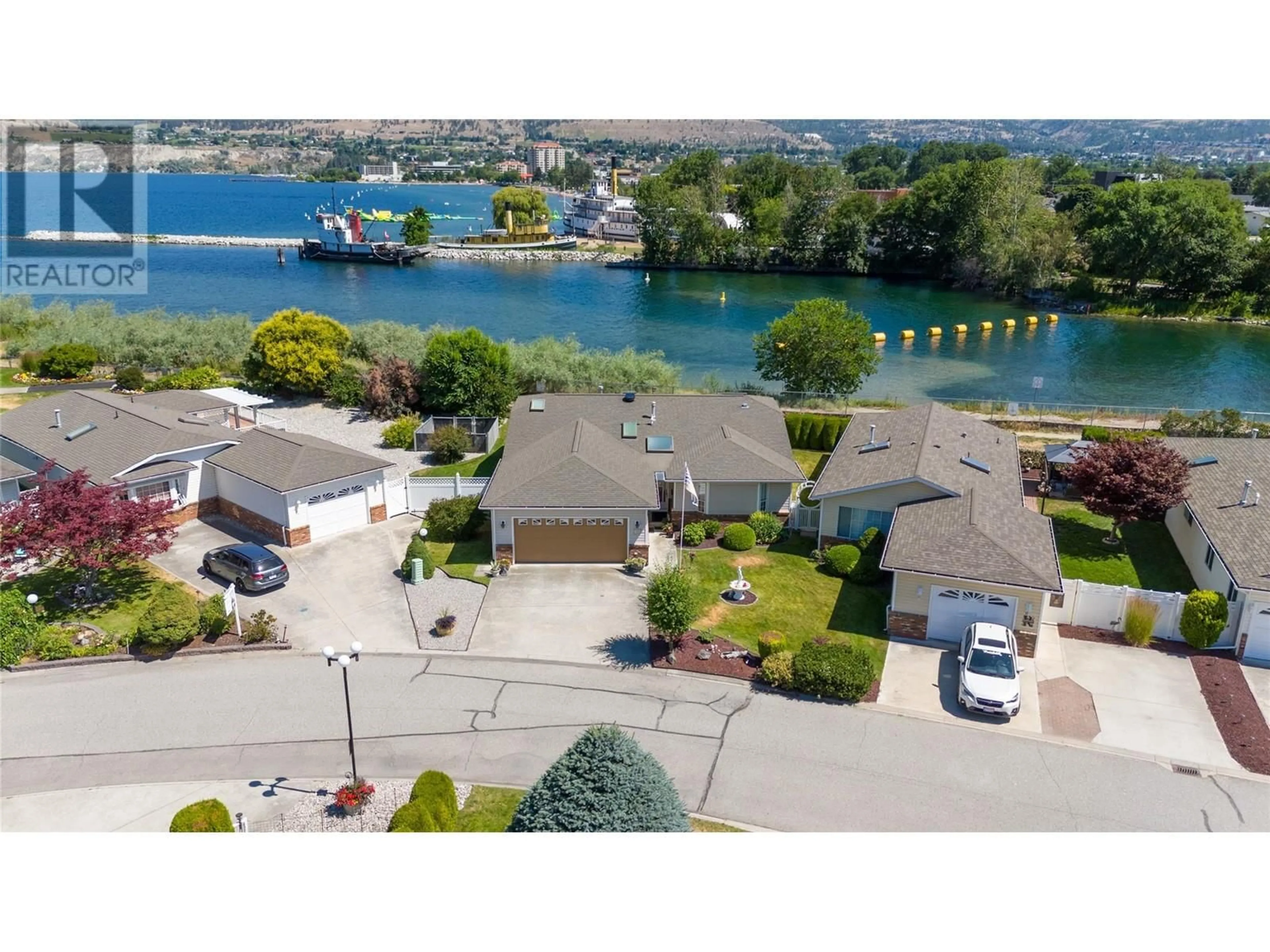 A pic from outside/outdoor area/front of a property/back of a property/a pic from drone, water/lake/river/ocean view for 43 Kingfisher Drive, Penticton British Columbia V2A8K6