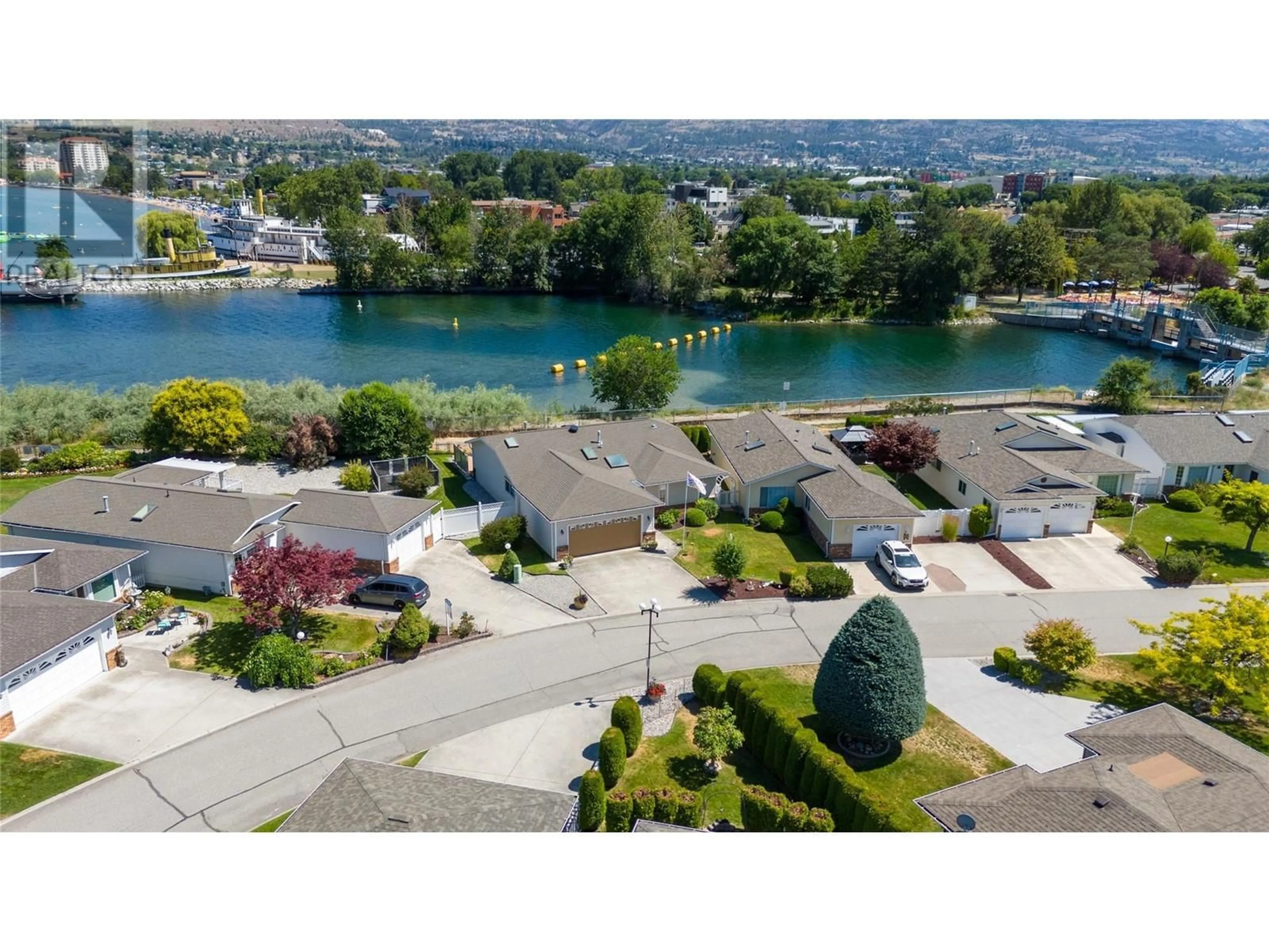 A pic from outside/outdoor area/front of a property/back of a property/a pic from drone, water/lake/river/ocean view for 43 Kingfisher Drive, Penticton British Columbia V2A8K6