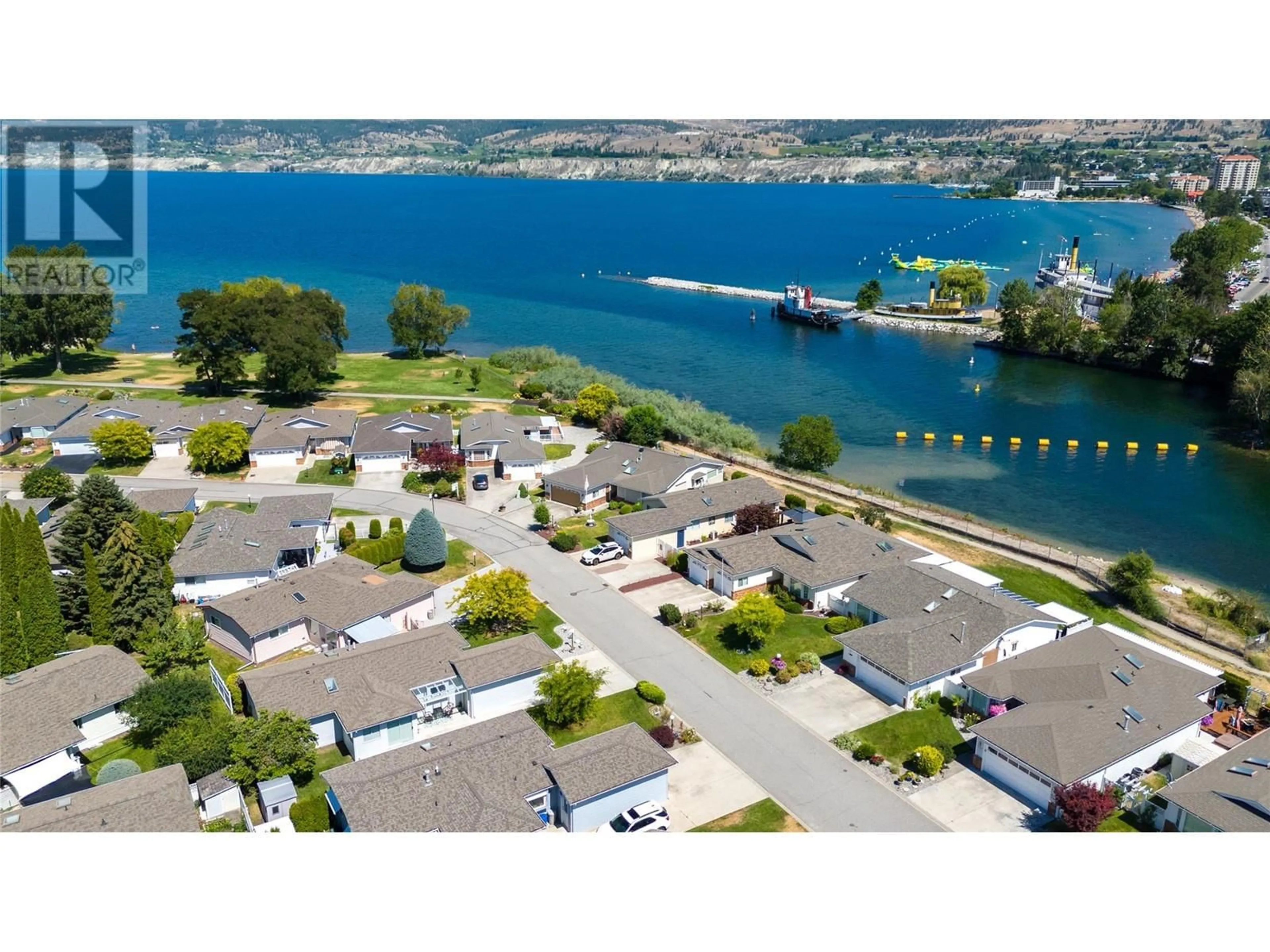 A pic from outside/outdoor area/front of a property/back of a property/a pic from drone, water/lake/river/ocean view for 43 Kingfisher Drive, Penticton British Columbia V2A8K6