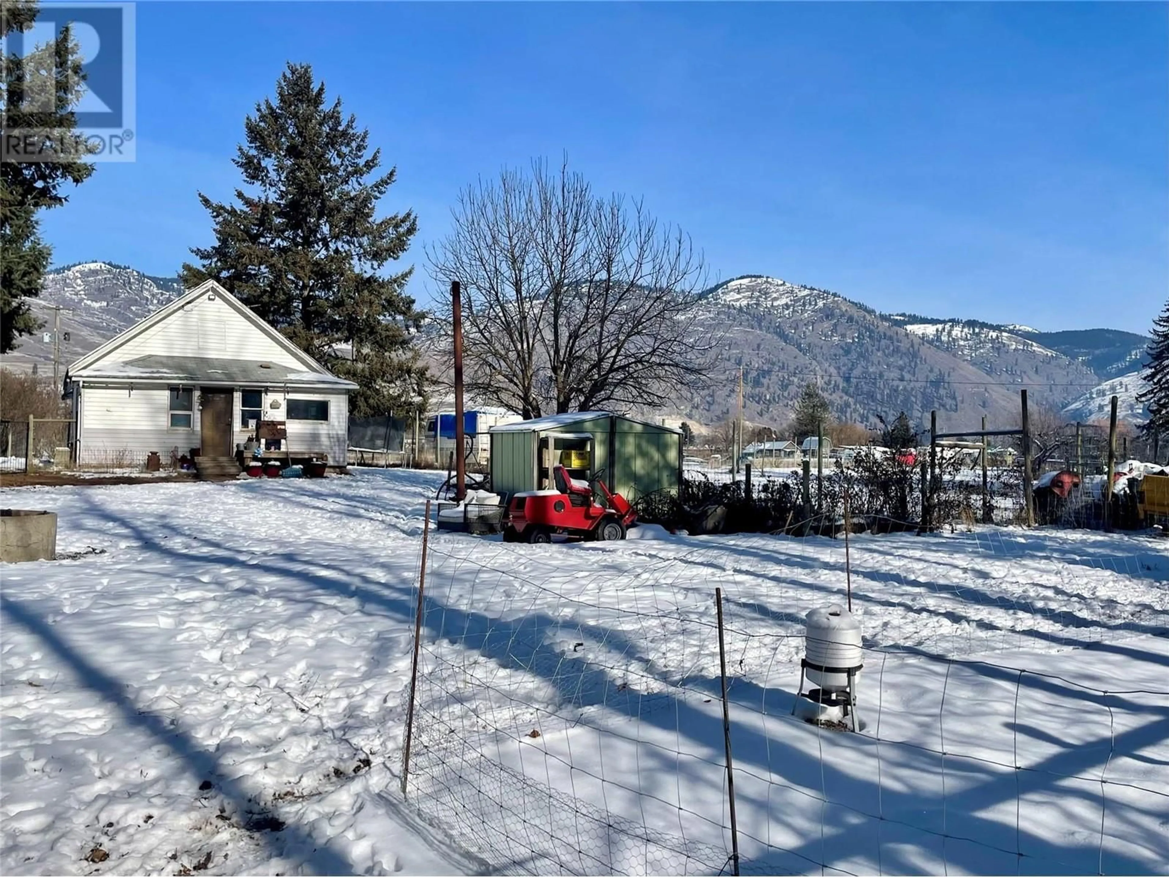 A pic from outside/outdoor area/front of a property/back of a property/a pic from drone, mountain view for 5525 Nursery Road, Grand Forks British Columbia V0H1H9