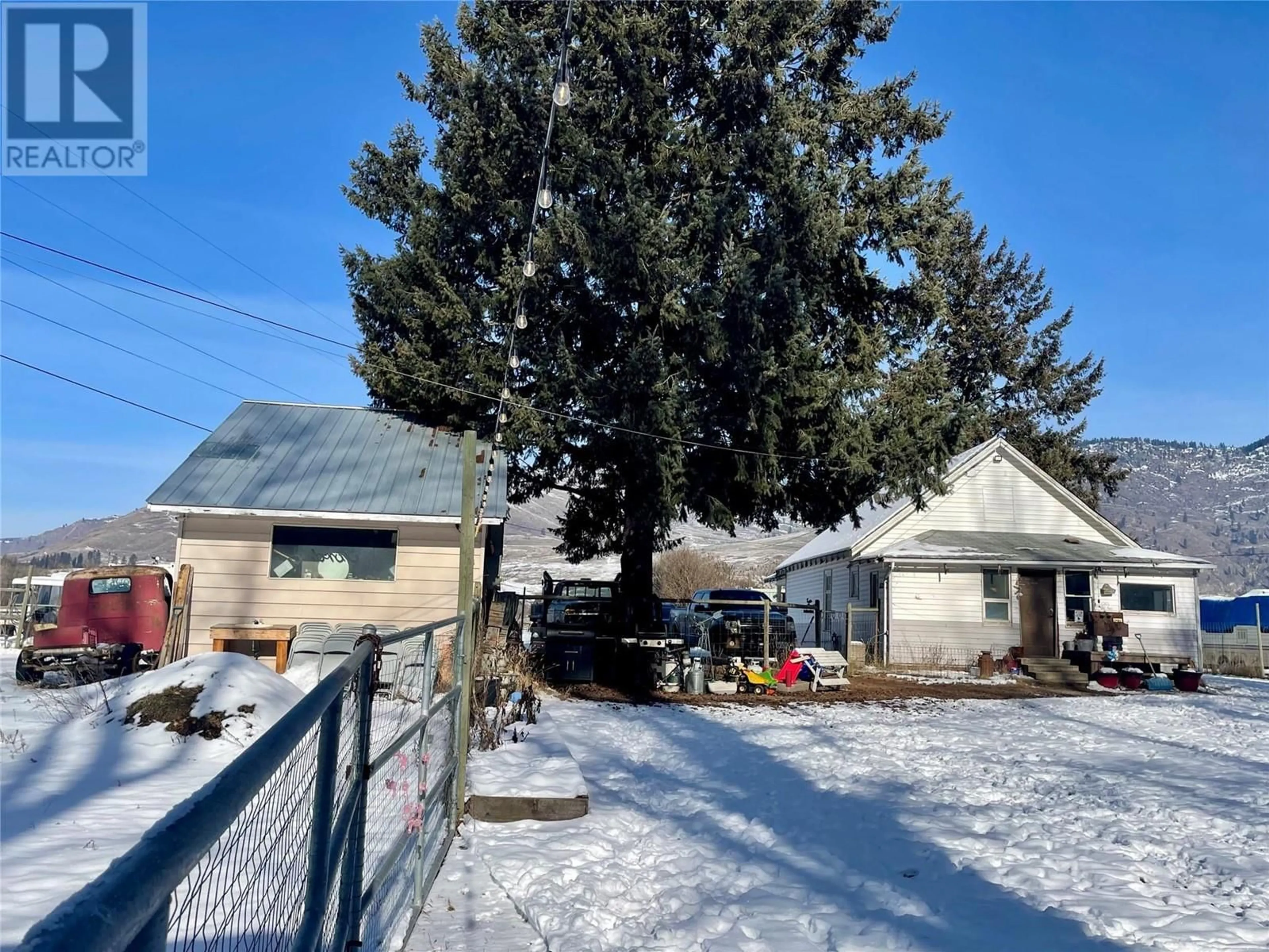 A pic from outside/outdoor area/front of a property/back of a property/a pic from drone, street for 5525 Nursery Road, Grand Forks British Columbia V0H1H9