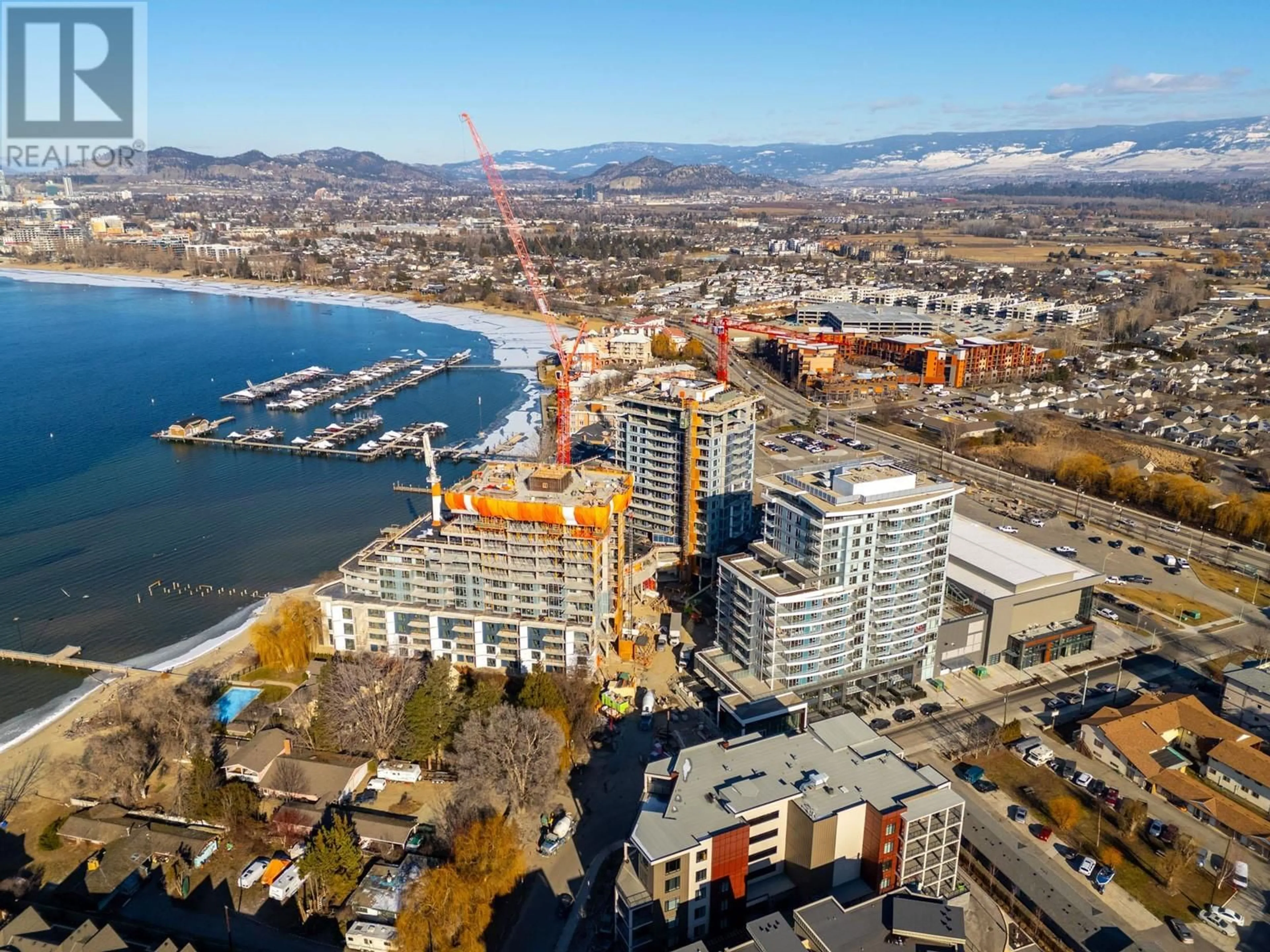 A pic from outside/outdoor area/front of a property/back of a property/a pic from drone, water/lake/river/ocean view for 607 - 3699 CAPOZZI ROAD, Kelowna British Columbia V1W0G3