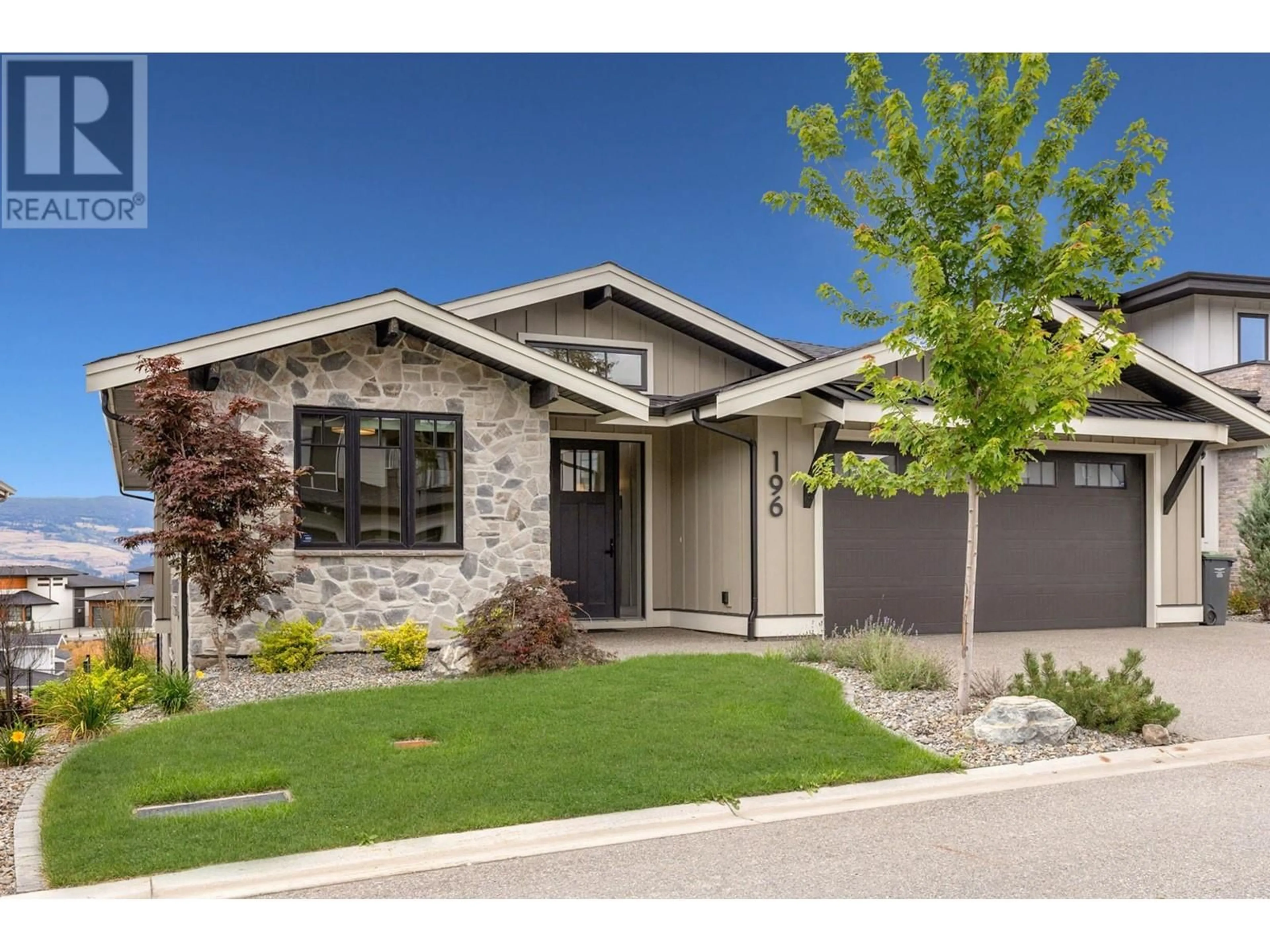 Home with brick exterior material, street for 196 Summer Wood Drive, Kelowna British Columbia V1V2Z9