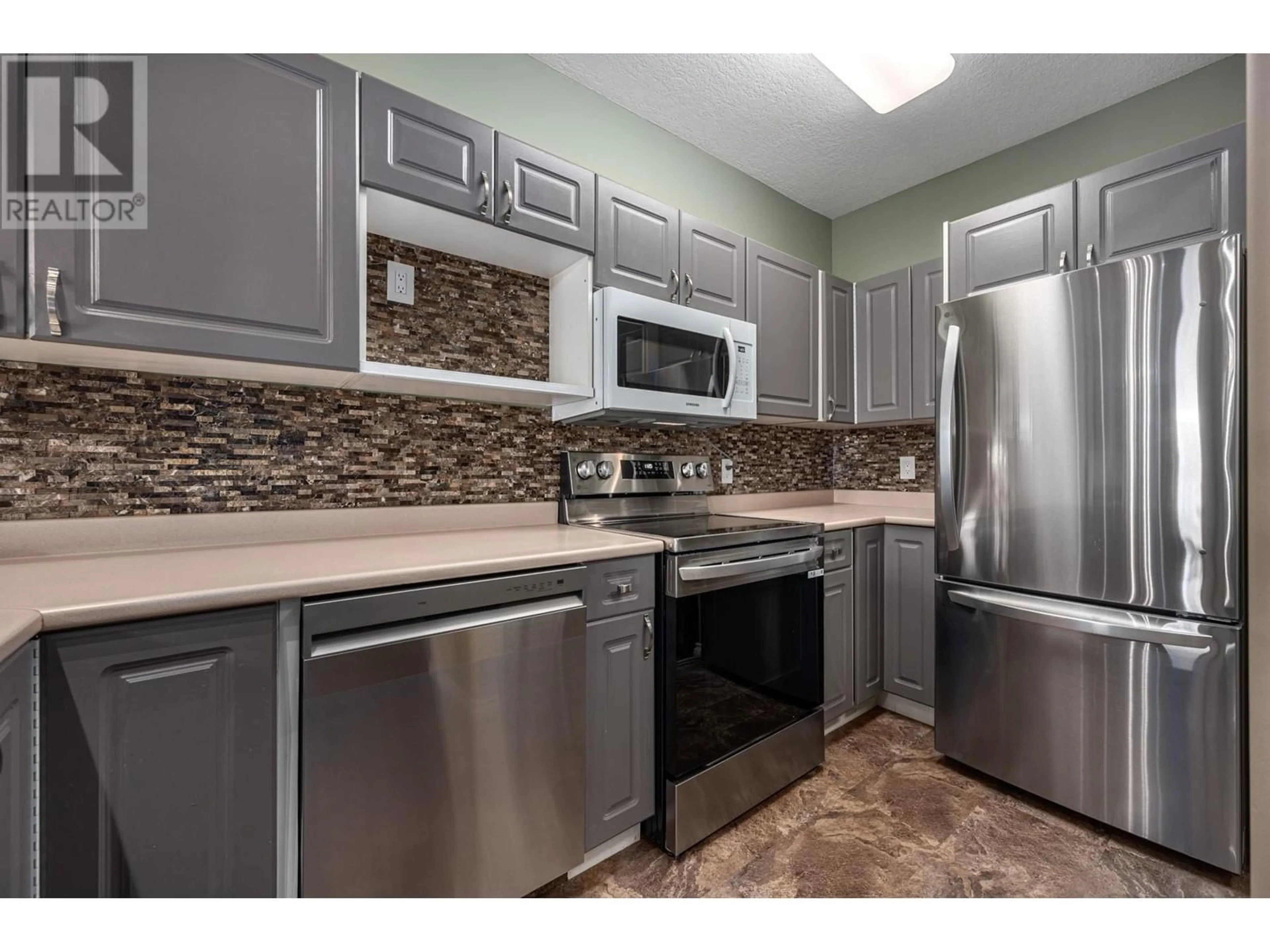 Standard kitchen, ceramic/tile floor for 712 SAHALI Terrace Unit# 202, Kamloops British Columbia V2C6T2