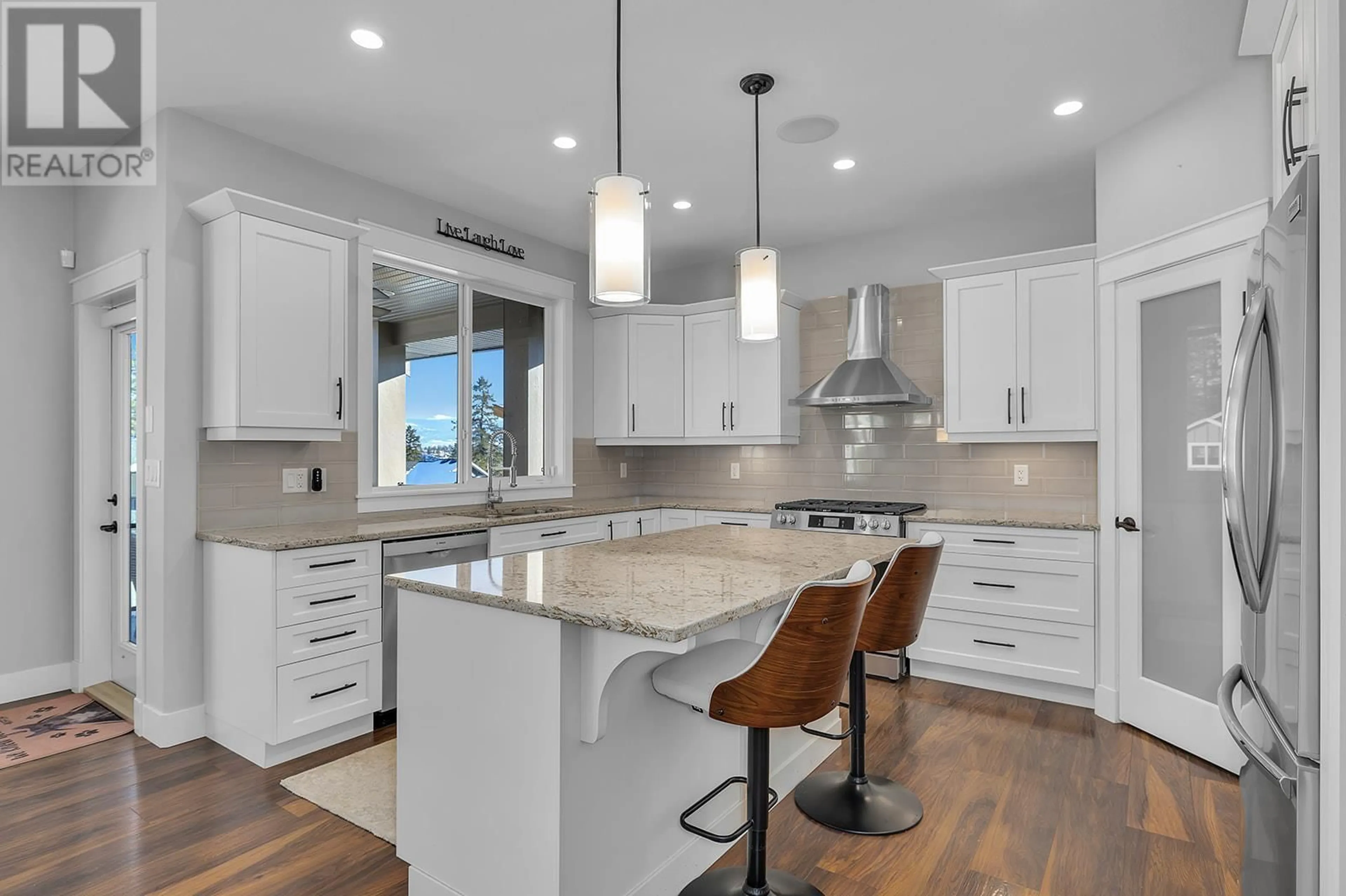 Contemporary kitchen, ceramic/tile floor for 2358 TALLUS GREEN CRESCENT, West Kelowna British Columbia V4T3K4
