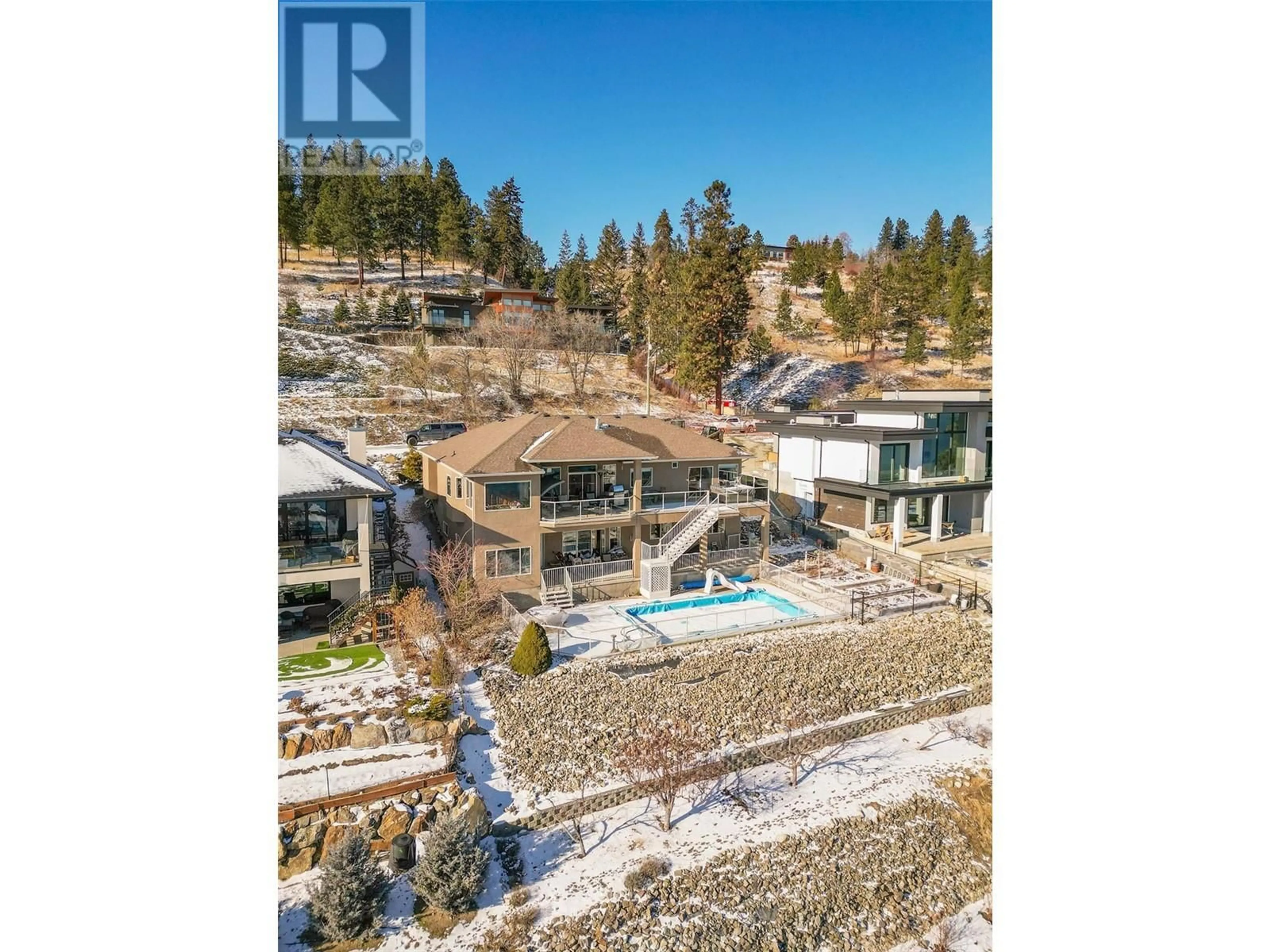 A pic from outside/outdoor area/front of a property/back of a property/a pic from drone, water/lake/river/ocean view for 6469 Bulyea Avenue, Peachland British Columbia V0H1X7