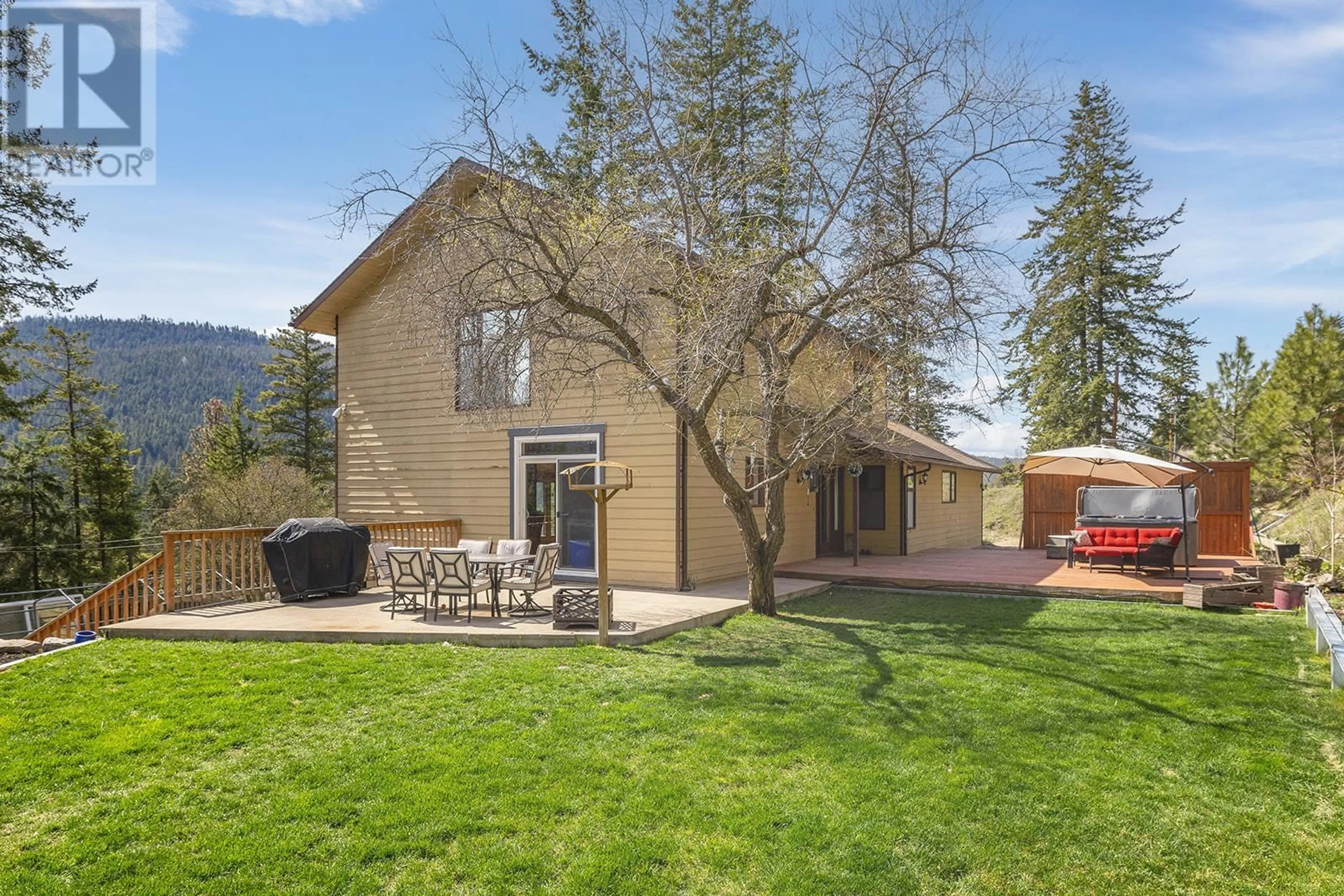 A pic from outside/outdoor area/front of a property/back of a property/a pic from drone, mountain view for 6750 HIGHWAY 33 OTHER EAST, Kelowna British Columbia V1P1H9