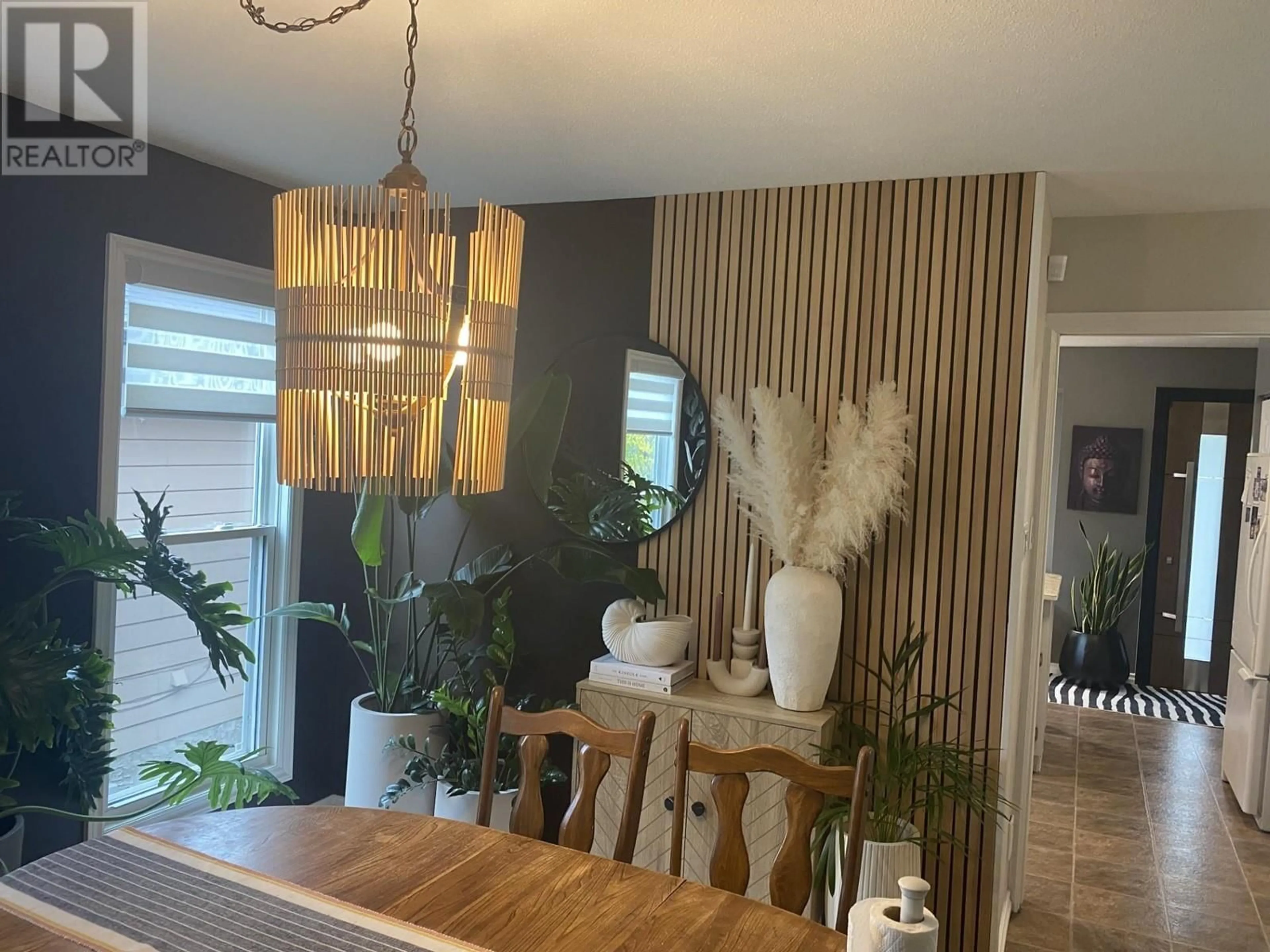 Dining room, wood/laminate floor for 1710 CEDARWOOD Court, Dawson Creek British Columbia V1G4L8