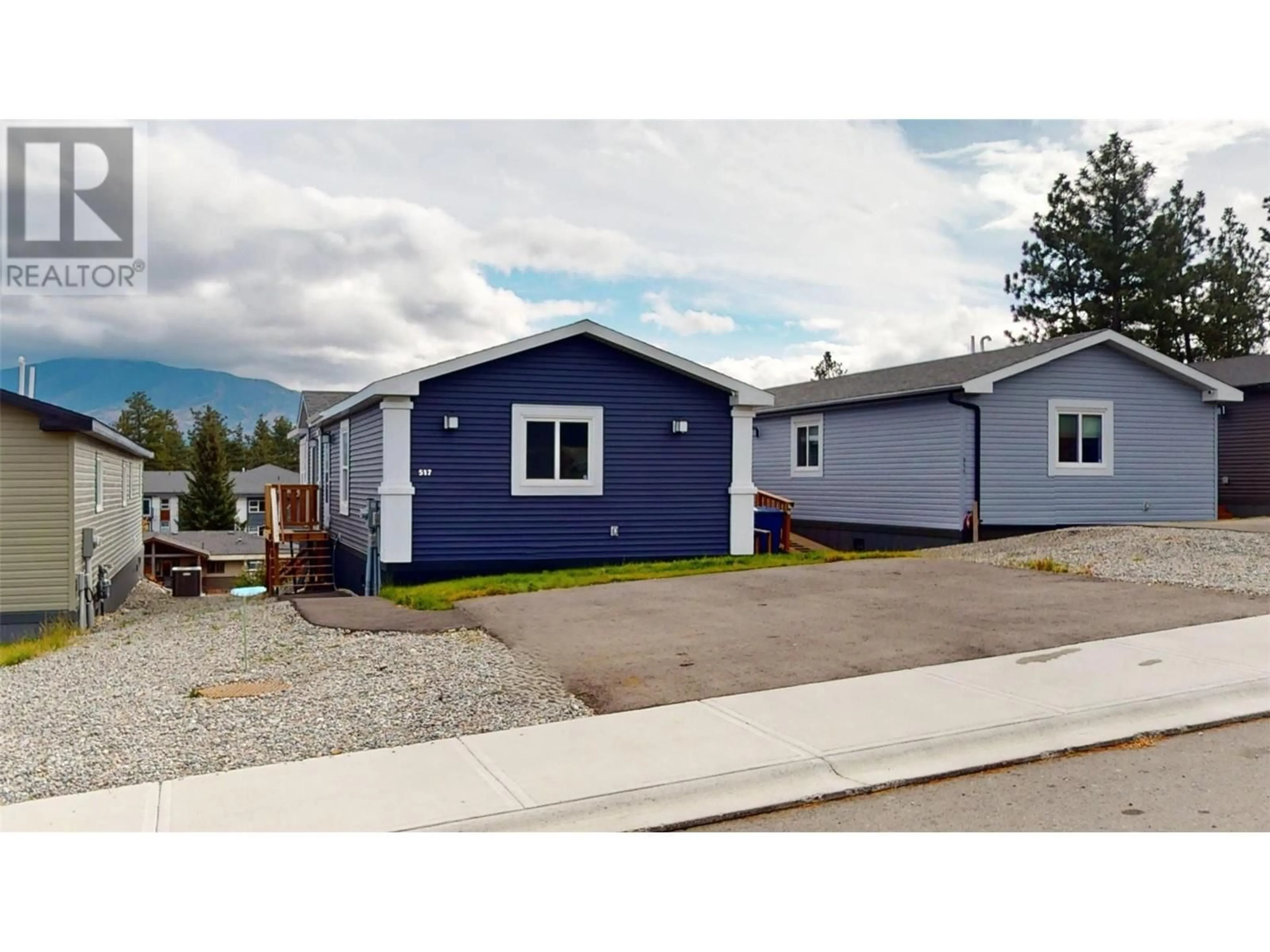 Home with vinyl exterior material, street for 517 PAGURUT  W AVENUE, Cranbrook British Columbia V1C0G5