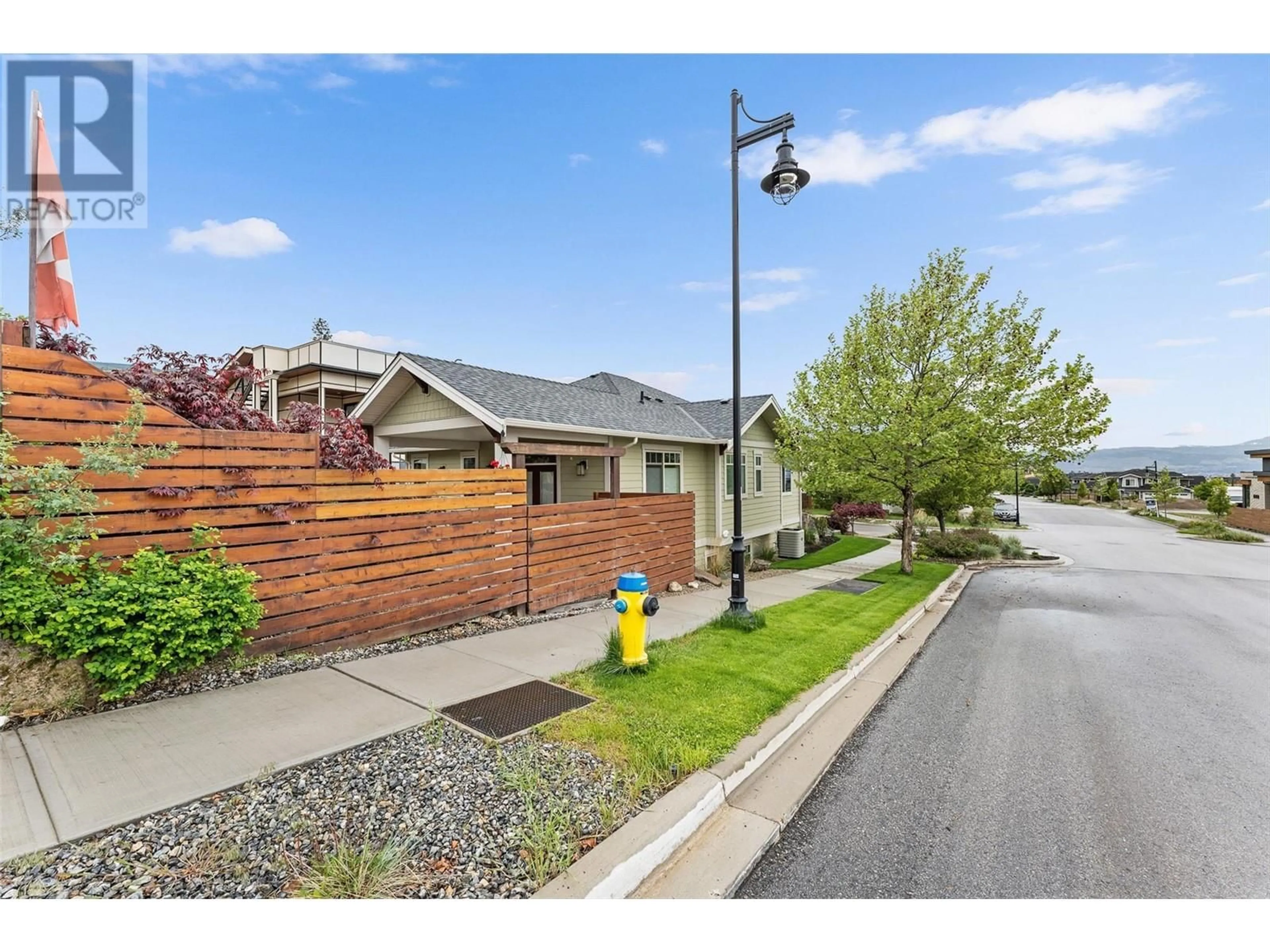 A pic from outside/outdoor area/front of a property/back of a property/a pic from drone, street for 5090 TWINFLOWER CRESCENT, Kelowna British Columbia V1W5L8