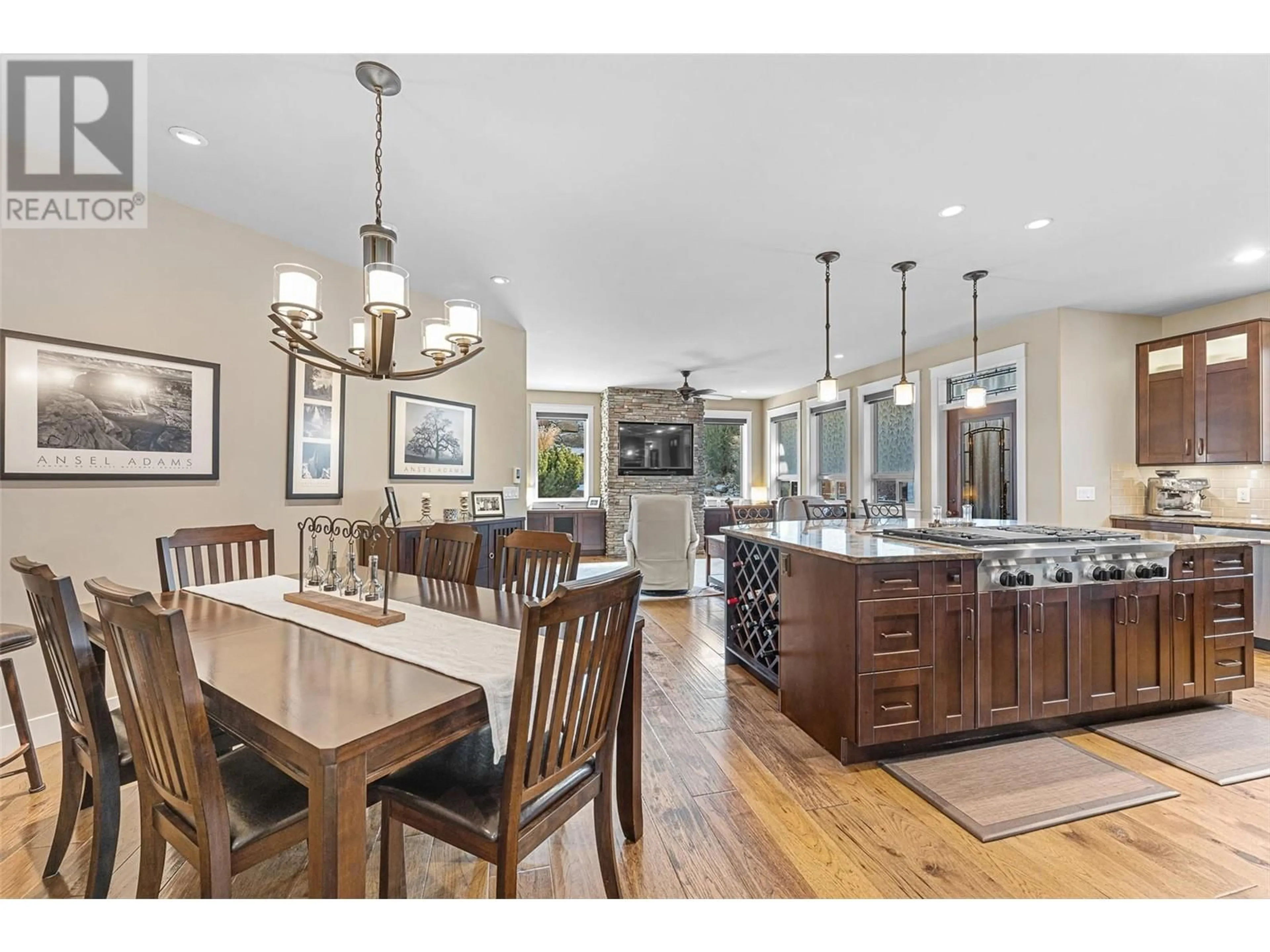Open concept kitchen, wood/laminate floor for 5090 TWINFLOWER CRESCENT, Kelowna British Columbia V1W5L8