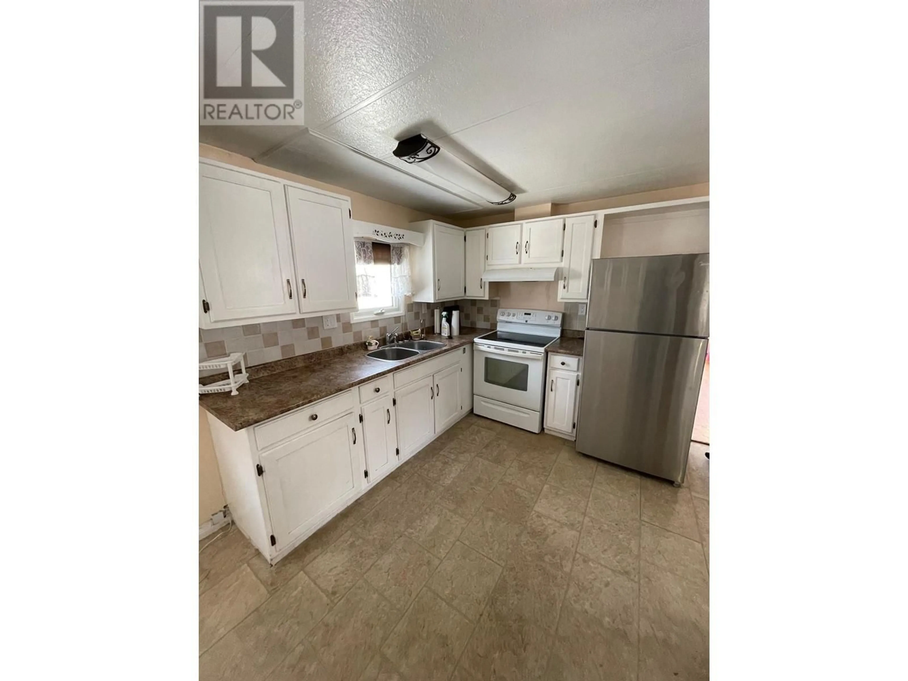 Standard kitchen, ceramic/tile floor for 100 Aspen Drive Unit# 94, Sparwood British Columbia V0B2G0