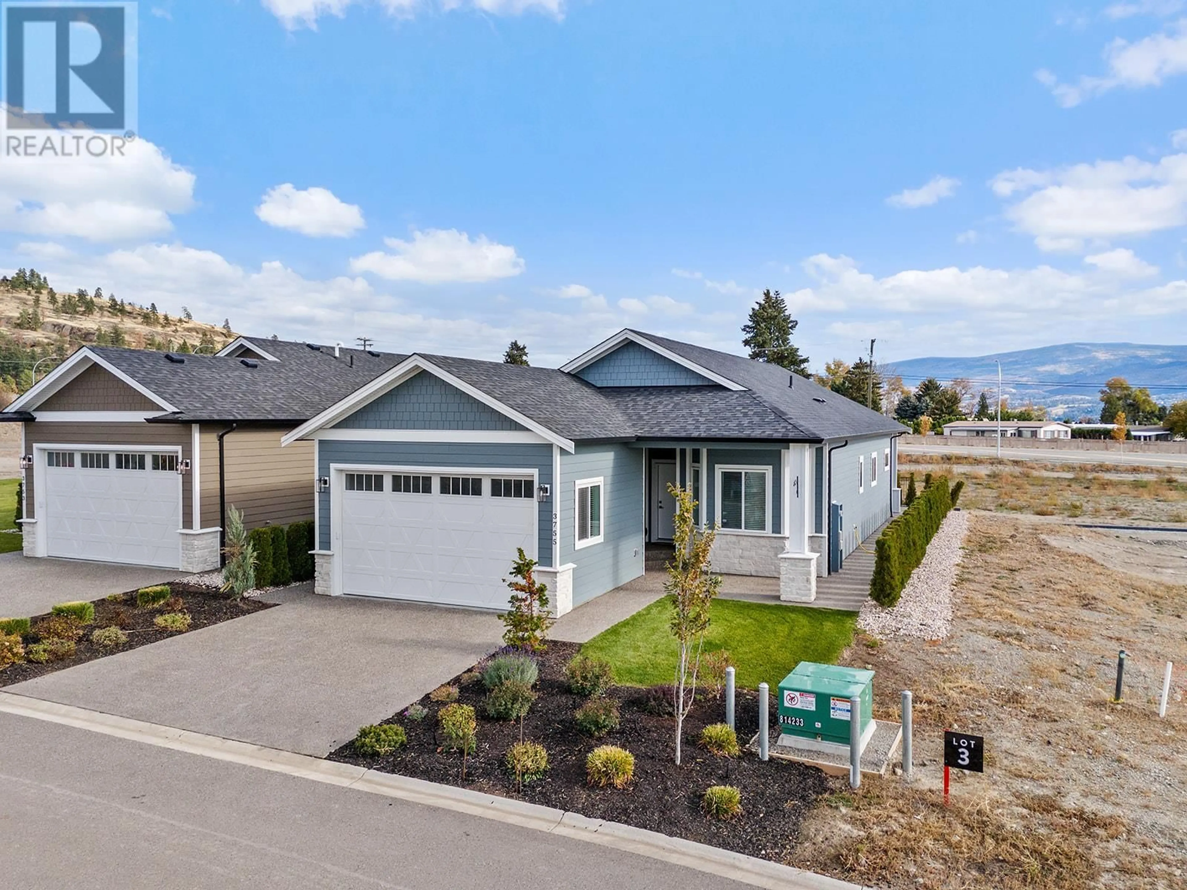 A pic from outside/outdoor area/front of a property/back of a property/a pic from drone, mountain view for 3755 St. James Drive, West Kelowna British Columbia V4T3A5