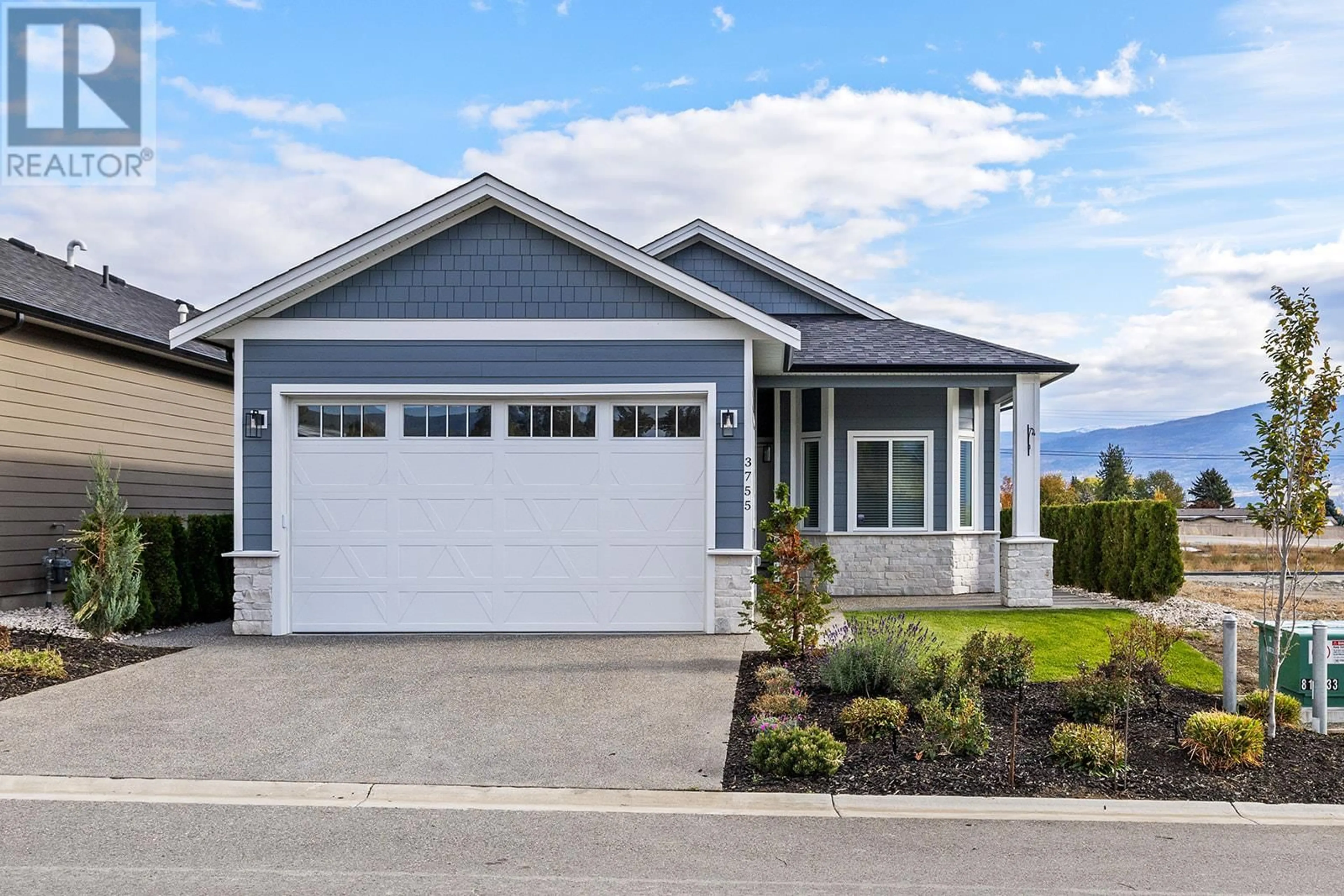 Home with vinyl exterior material, street for 3755 St. James Drive, West Kelowna British Columbia V4T3A5