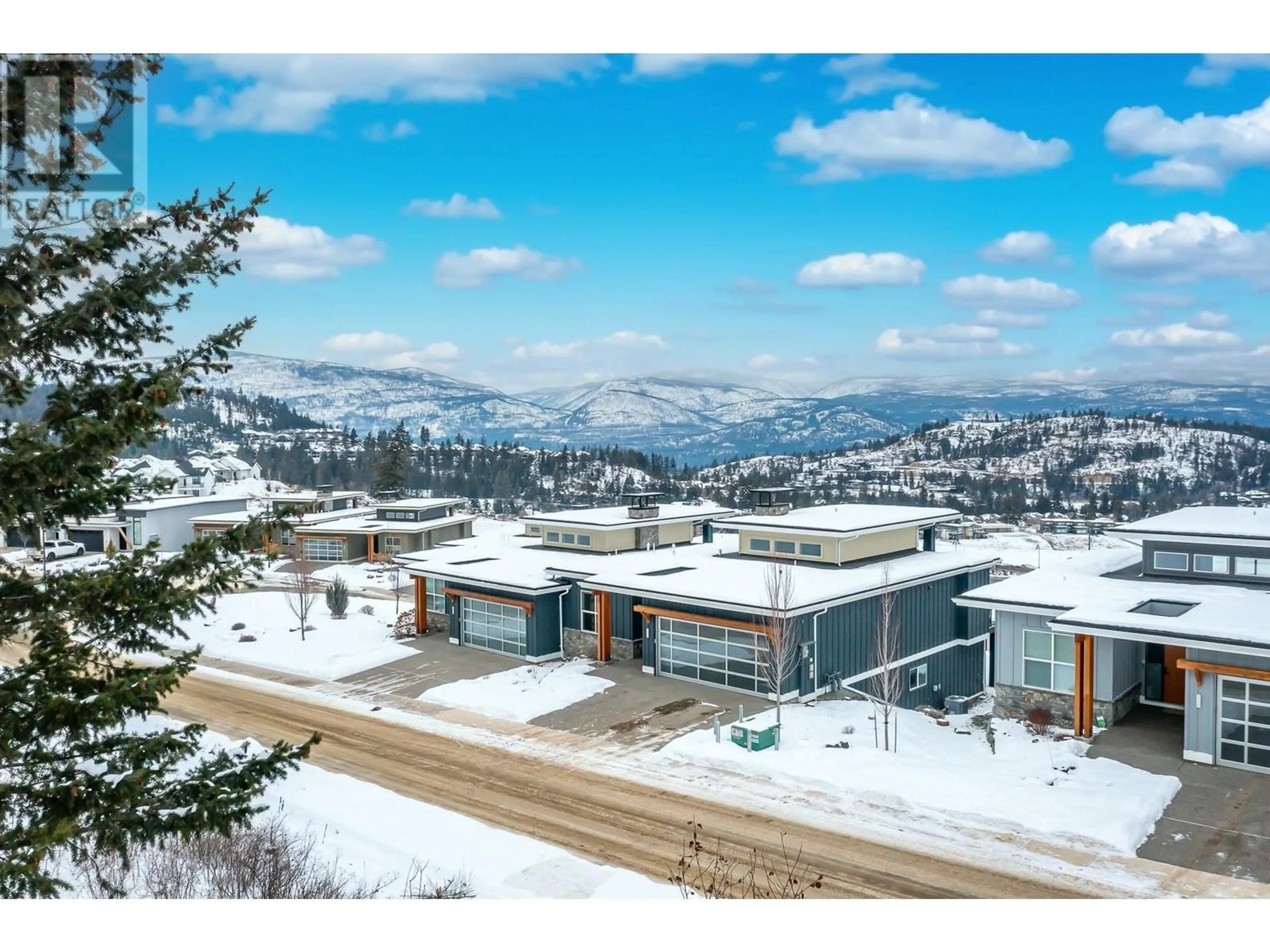 A pic from outside/outdoor area/front of a property/back of a property/a pic from drone, mountain view for 264 Diamond Way, Vernon British Columbia V1H0A2