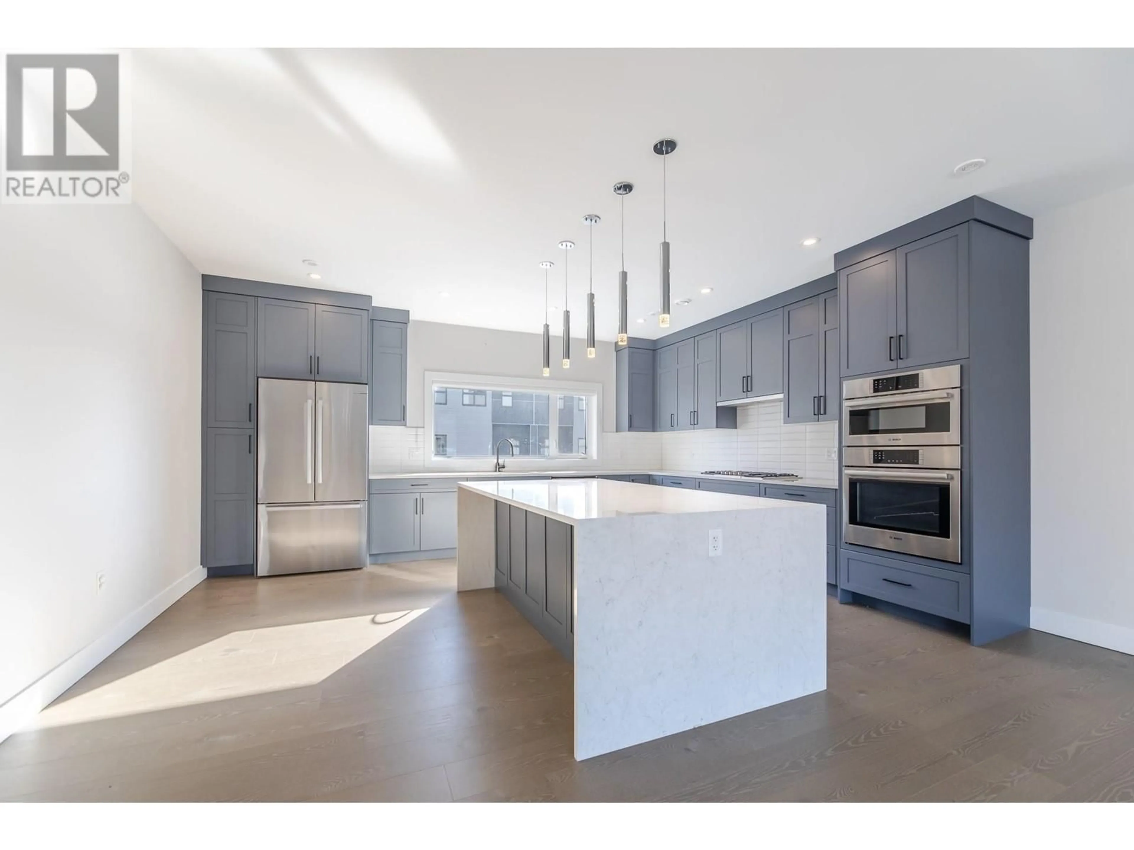 Open concept kitchen, ceramic/tile floor for 113 - 201 WYLIE STREET, Penticton British Columbia V2A0H3