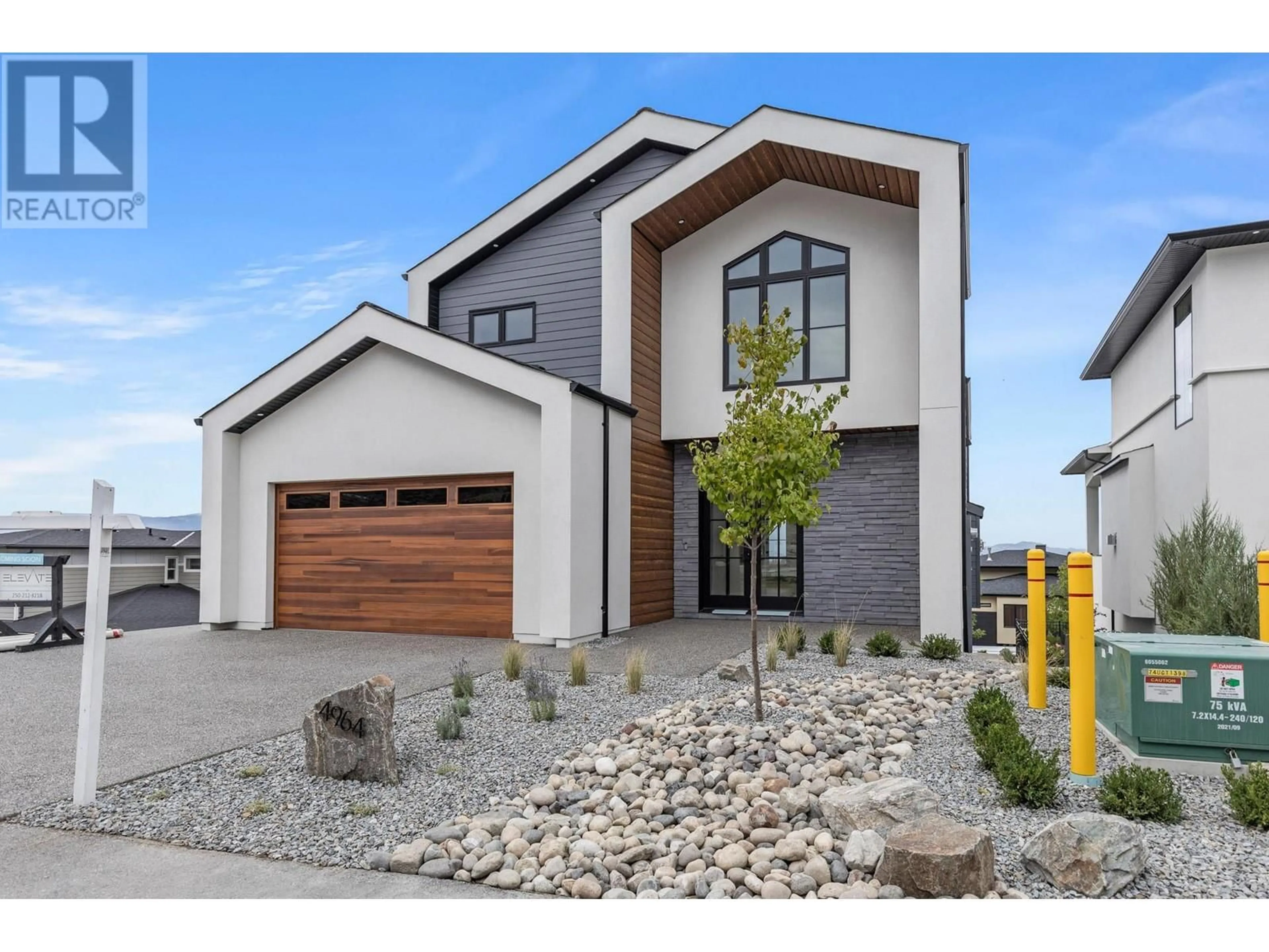 Home with brick exterior material, street for 4964 BUCKTAIL LANE, Kelowna British Columbia V1W5L3