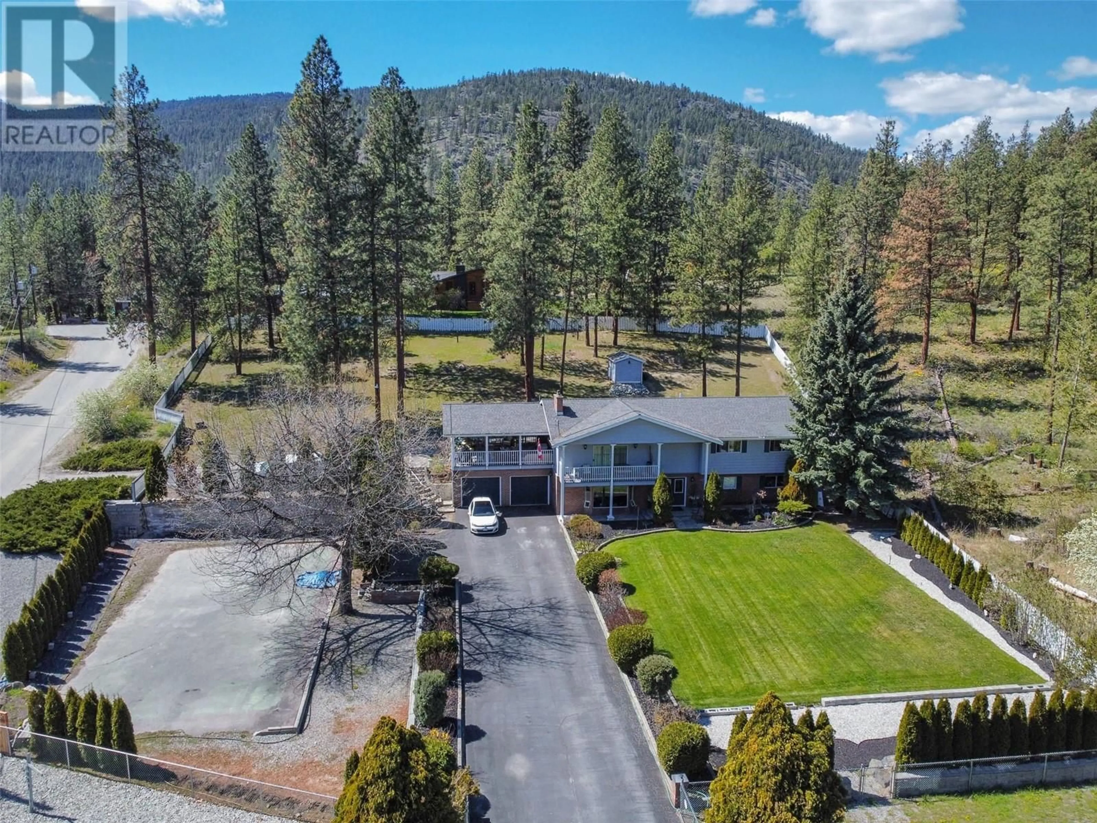 A pic from outside/outdoor area/front of a property/back of a property/a pic from drone, mountain view for 3808 Forsyth Drive, Penticton British Columbia V2A8Z2