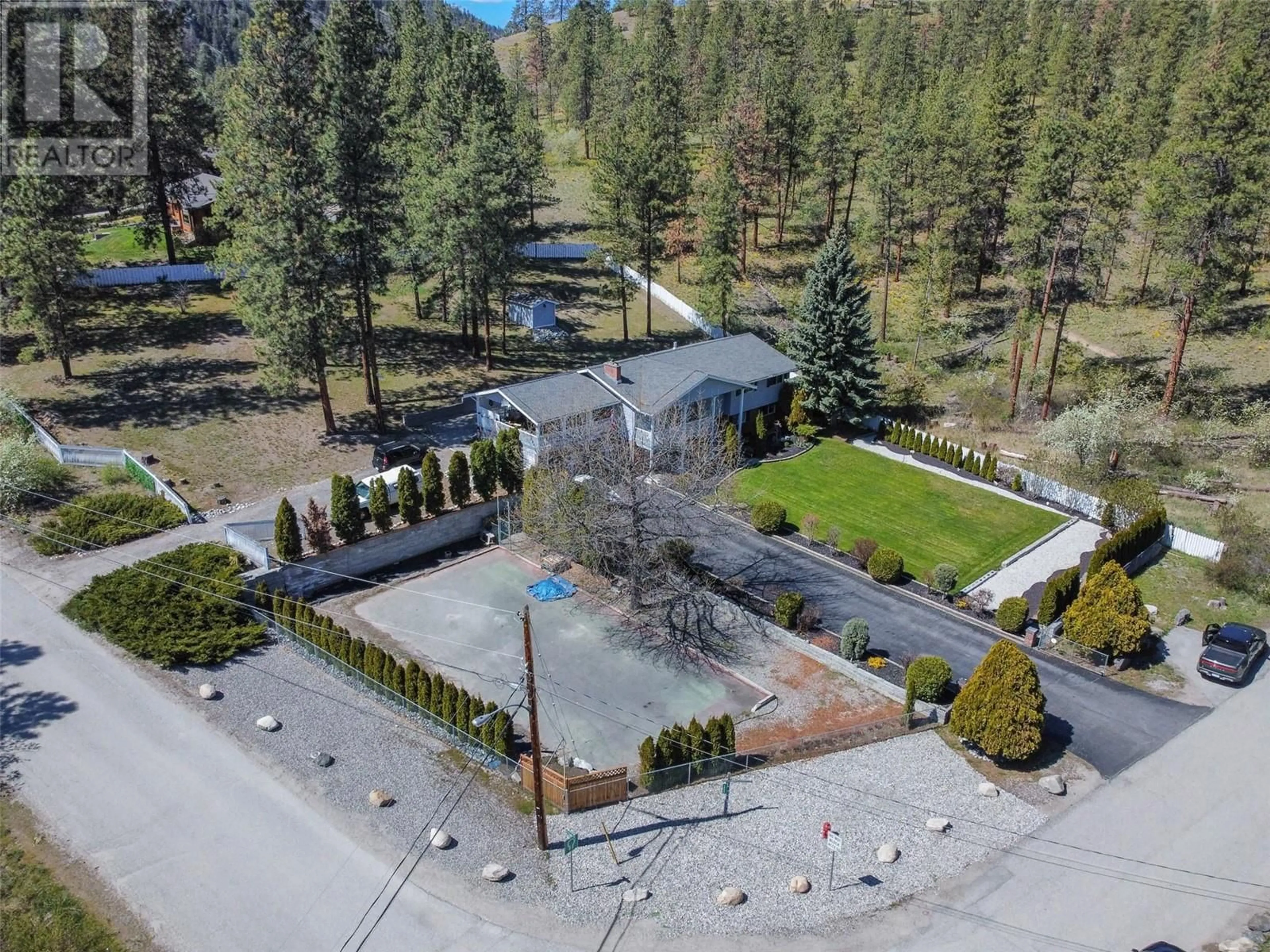 A pic from outside/outdoor area/front of a property/back of a property/a pic from drone, mountain view for 3808 Forsyth Drive, Penticton British Columbia V2A8Z2