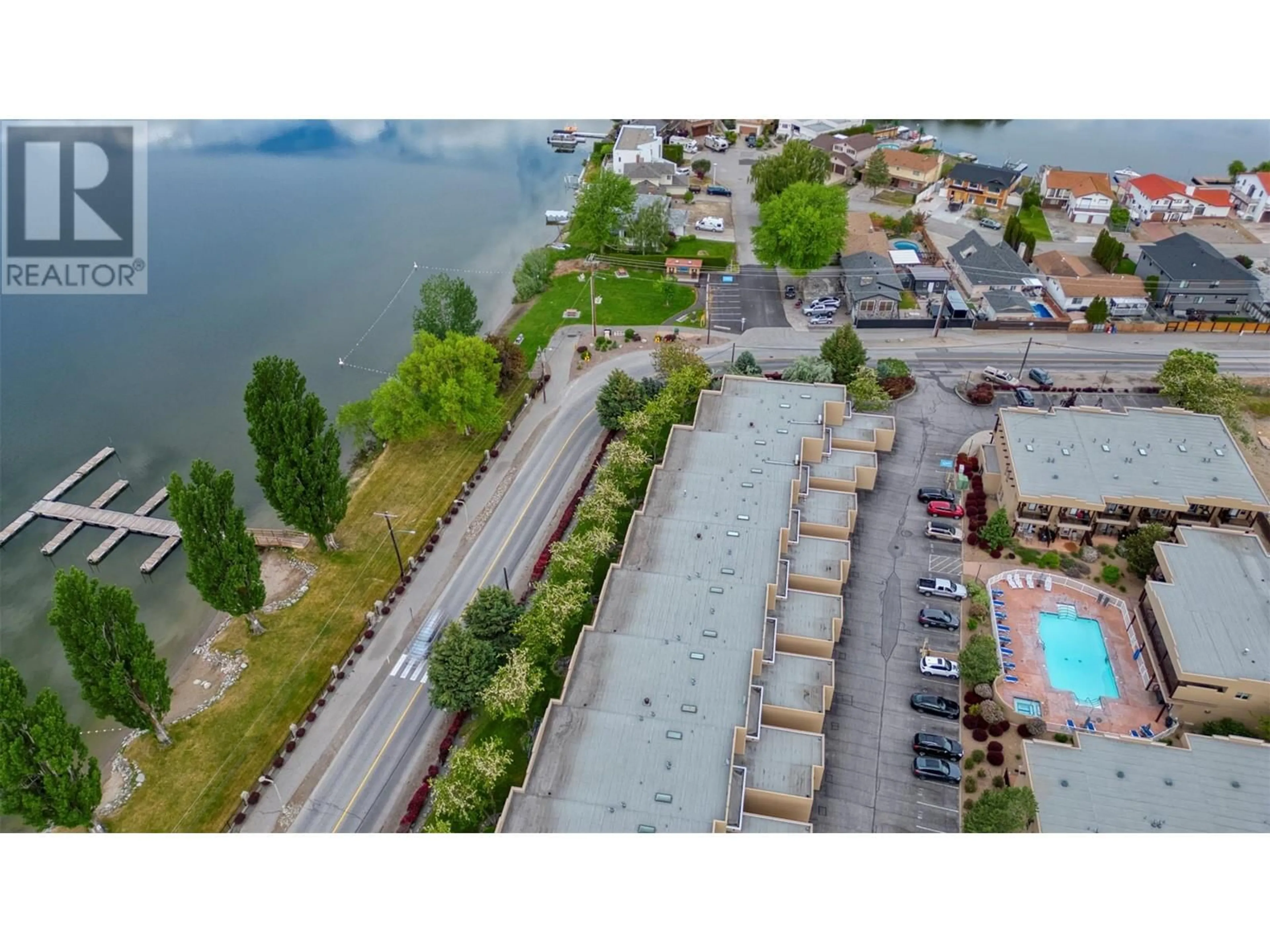 A pic from outside/outdoor area/front of a property/back of a property/a pic from drone, water/lake/river/ocean view for 102 - 5401 LAKESHORE DRIVE, Osoyoos British Columbia V0H1V3