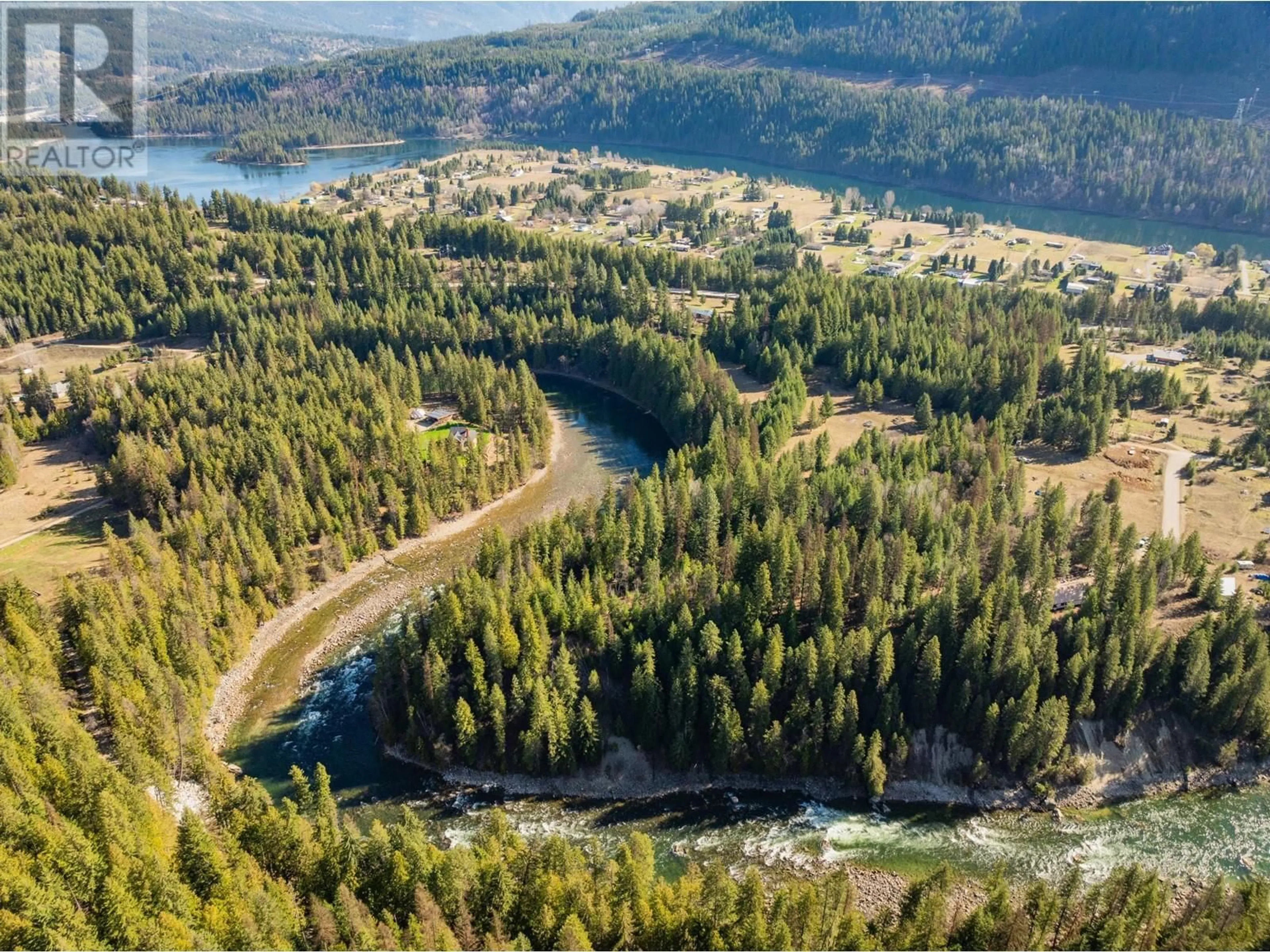 A pic from outside/outdoor area/front of a property/back of a property/a pic from drone, water/lake/river/ocean view for 2621 3A Highway, Castlegar British Columbia V1N3H3