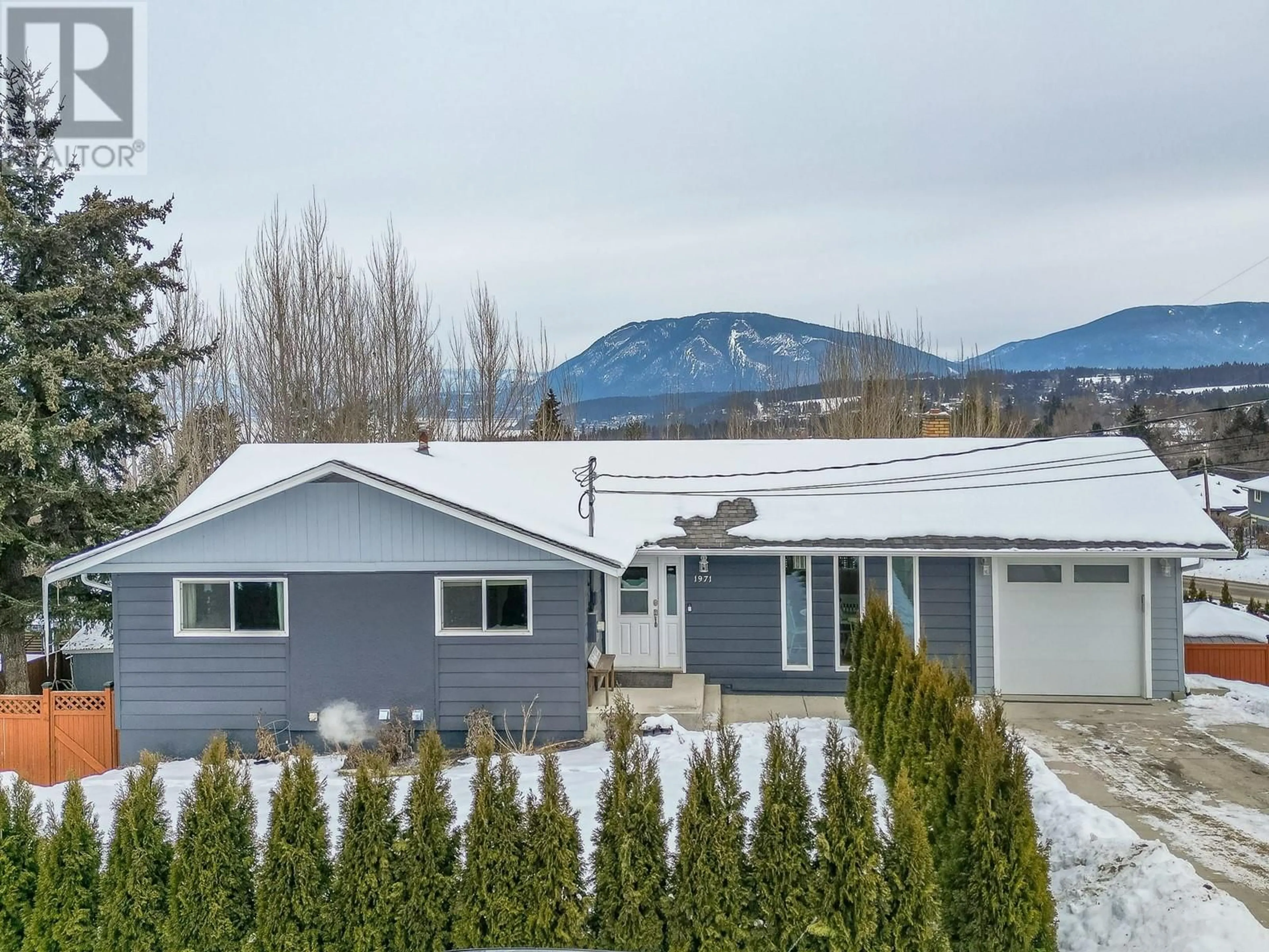 A pic from outside/outdoor area/front of a property/back of a property/a pic from drone, mountain view for 1971 3 Avenue SE, Salmon Arm British Columbia V1E1V2