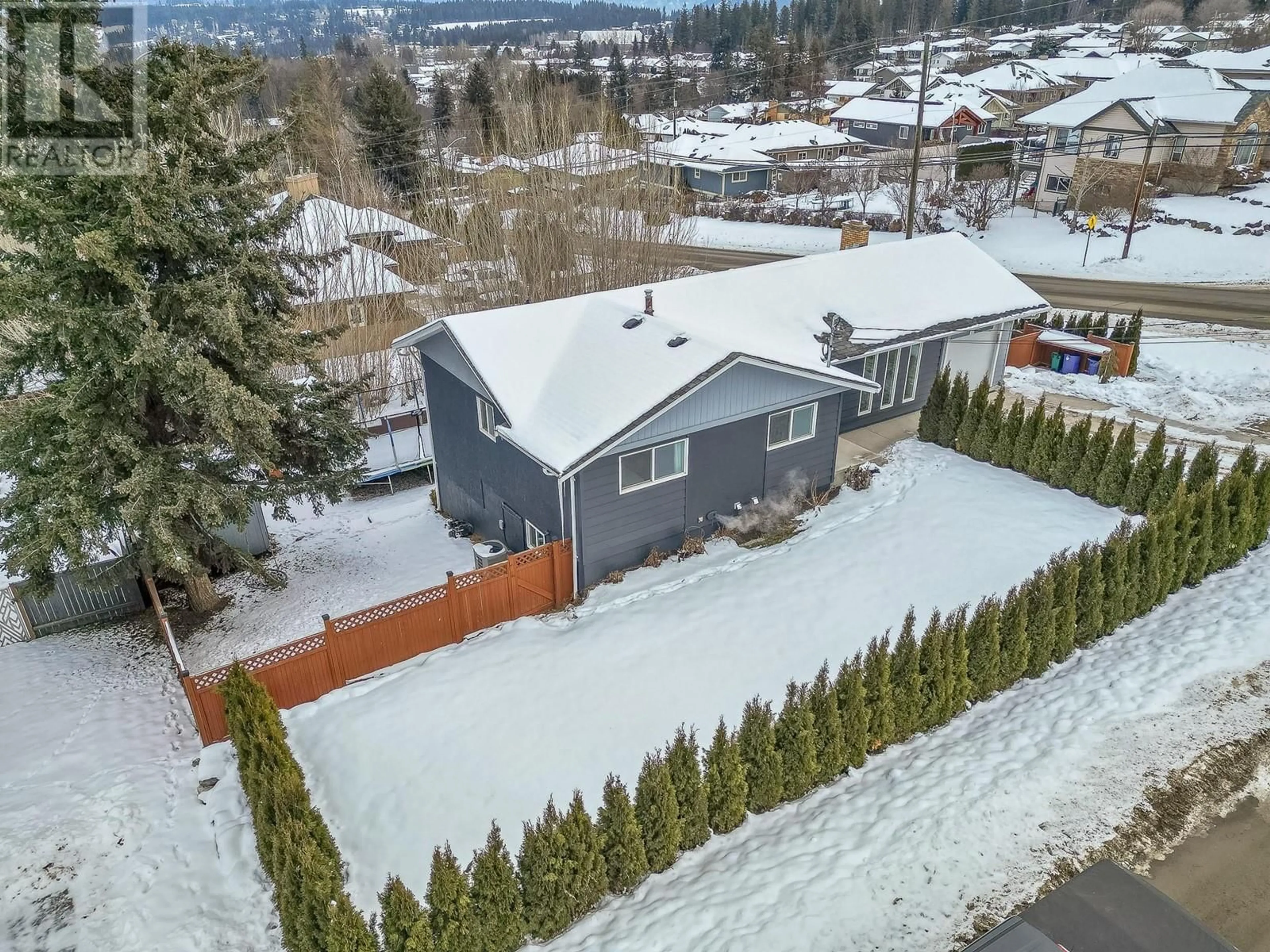 A pic from outside/outdoor area/front of a property/back of a property/a pic from drone, mountain view for 1971 3 Avenue SE, Salmon Arm British Columbia V1E1V2