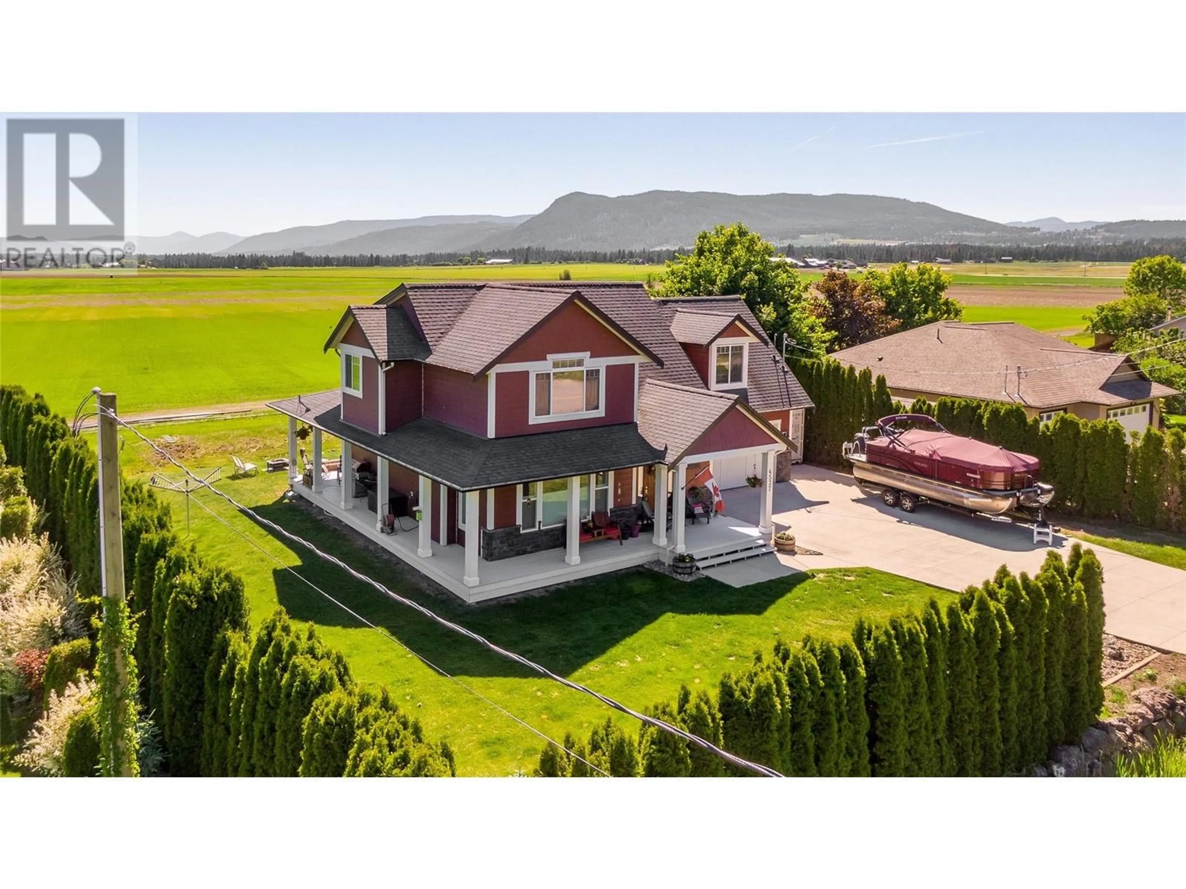 A pic from outside/outdoor area/front of a property/back of a property/a pic from drone, mountain view for 4537 LANSDOWNE ROAD, Armstrong British Columbia V0E1B8