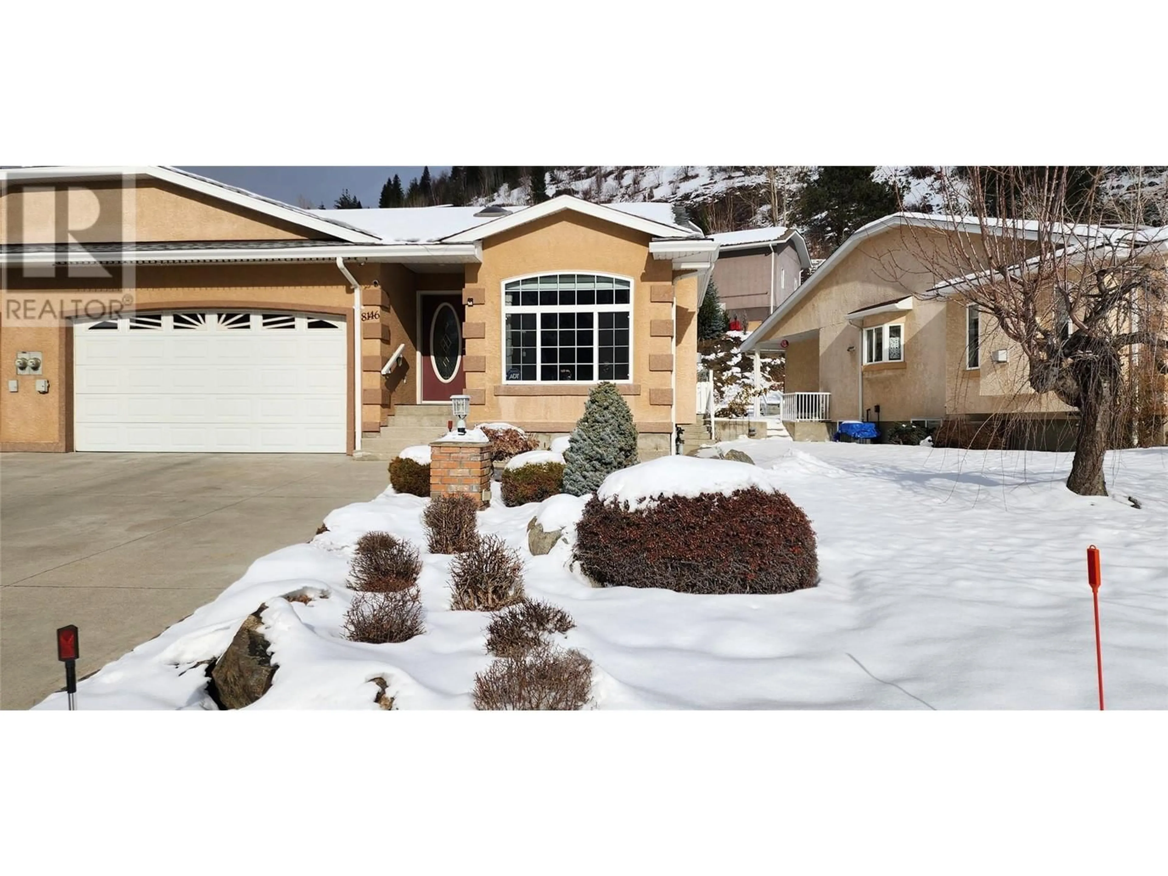 Home with vinyl exterior material, street for 8146 DeVito Drive, Trail British Columbia V1R4W1