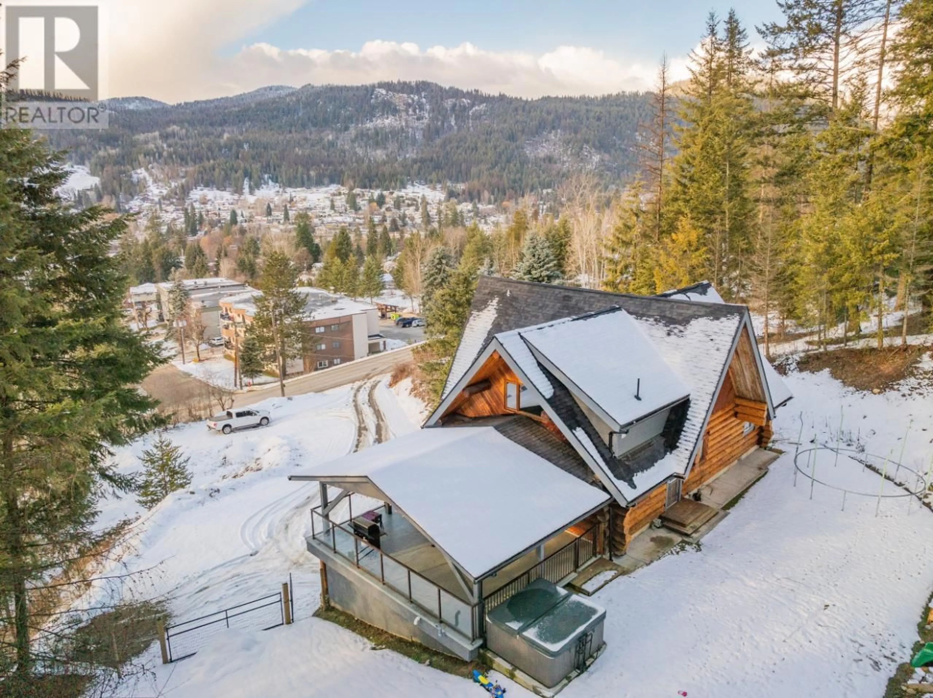 A pic from outside/outdoor area/front of a property/back of a property/a pic from drone, mountain view for 1856 GREEN ROAD, Fruitvale British Columbia V0G1L0