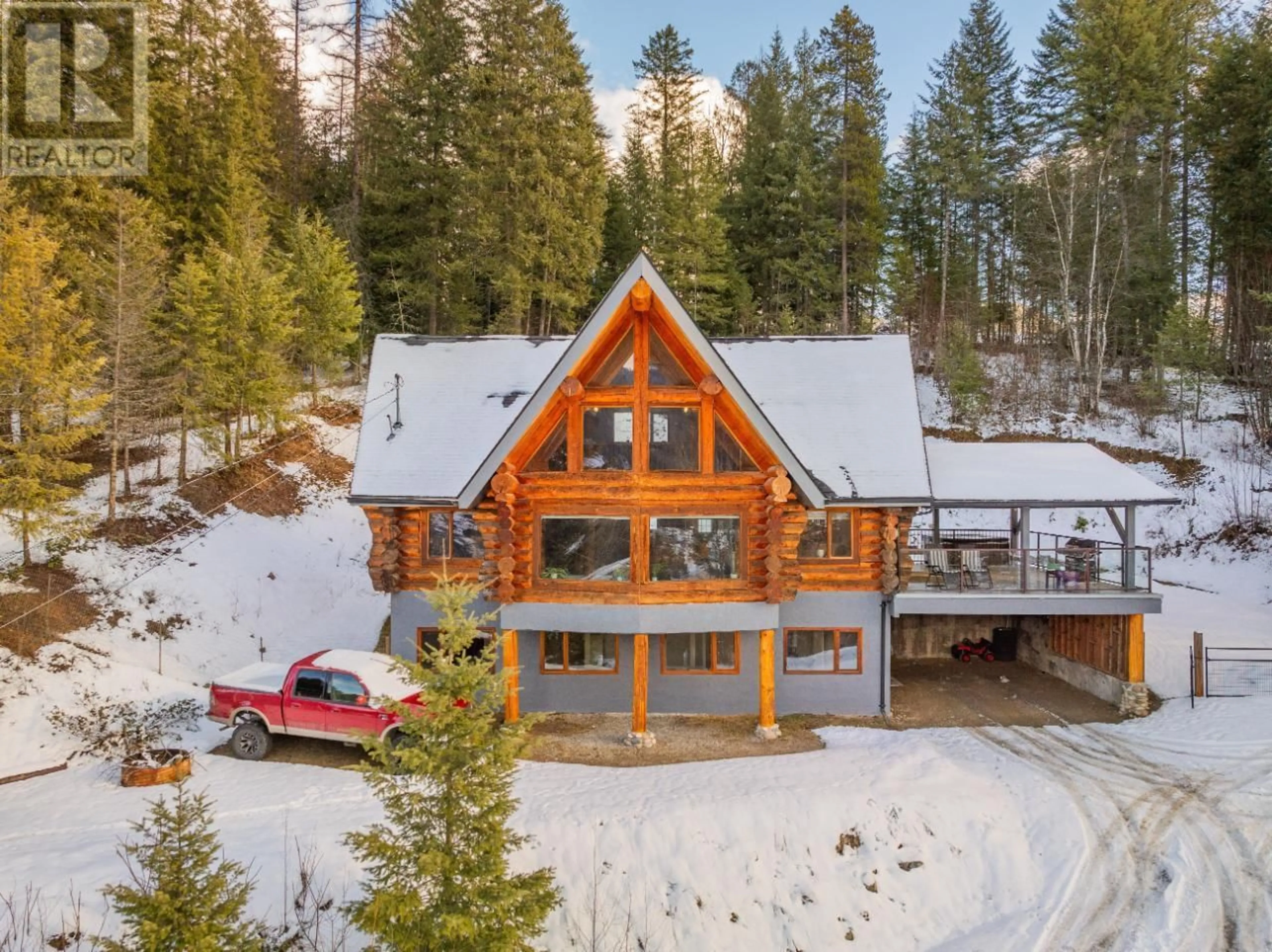 A pic from outside/outdoor area/front of a property/back of a property/a pic from drone, mountain view for 1856 GREEN ROAD, Fruitvale British Columbia V0G1L0