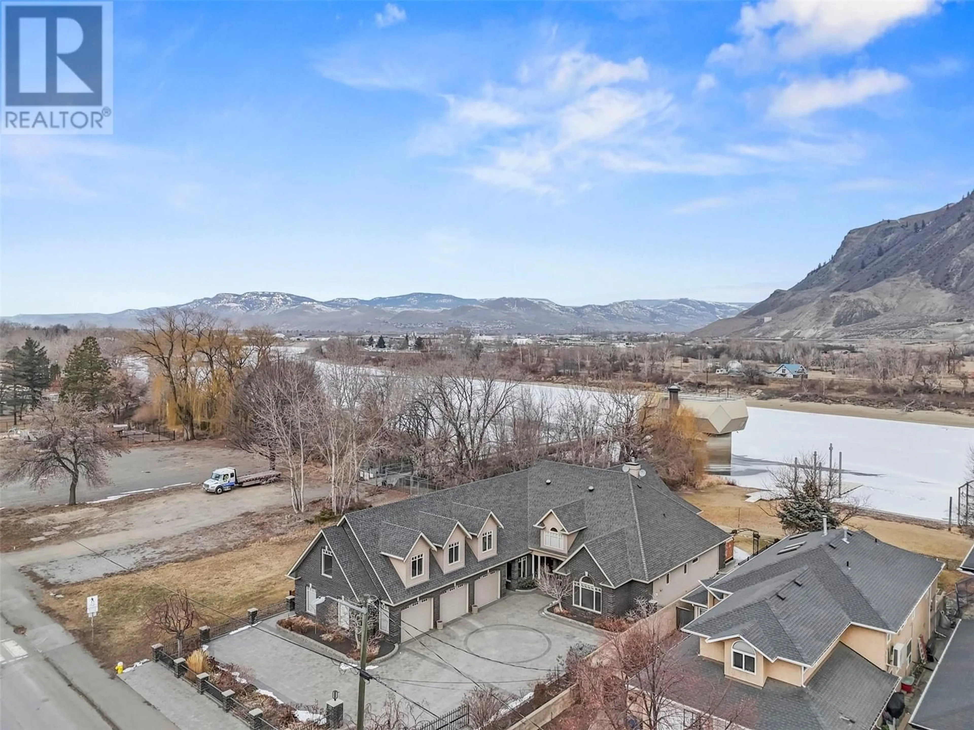 A pic from outside/outdoor area/front of a property/back of a property/a pic from drone, water/lake/river/ocean view for 1304 RIVER Street, Kamloops British Columbia V2C1Y8