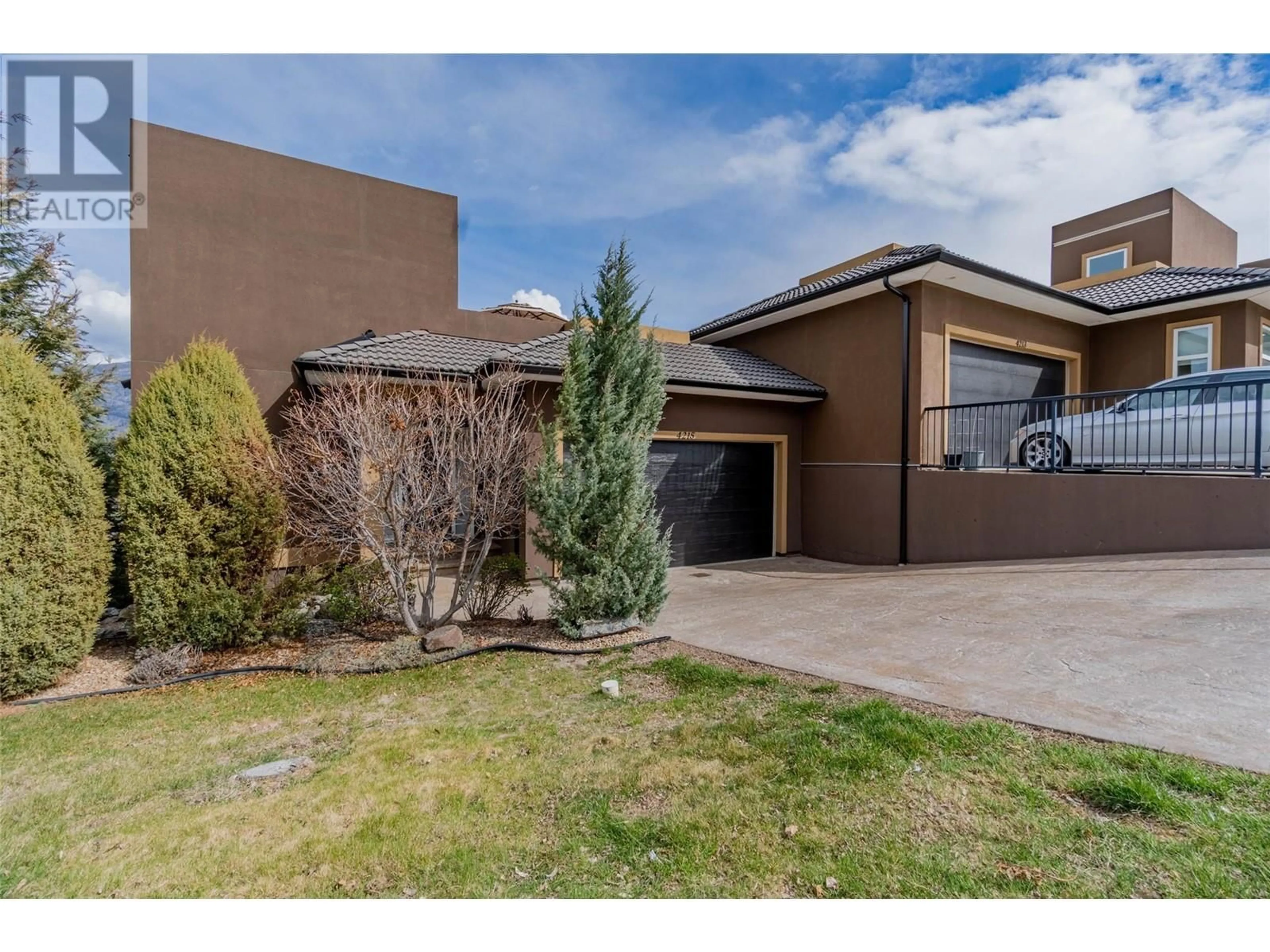 A pic from outside/outdoor area/front of a property/back of a property/a pic from drone, street for 4215 PEBBLE BEACH DRIVE, Osoyoos British Columbia V0H1V3
