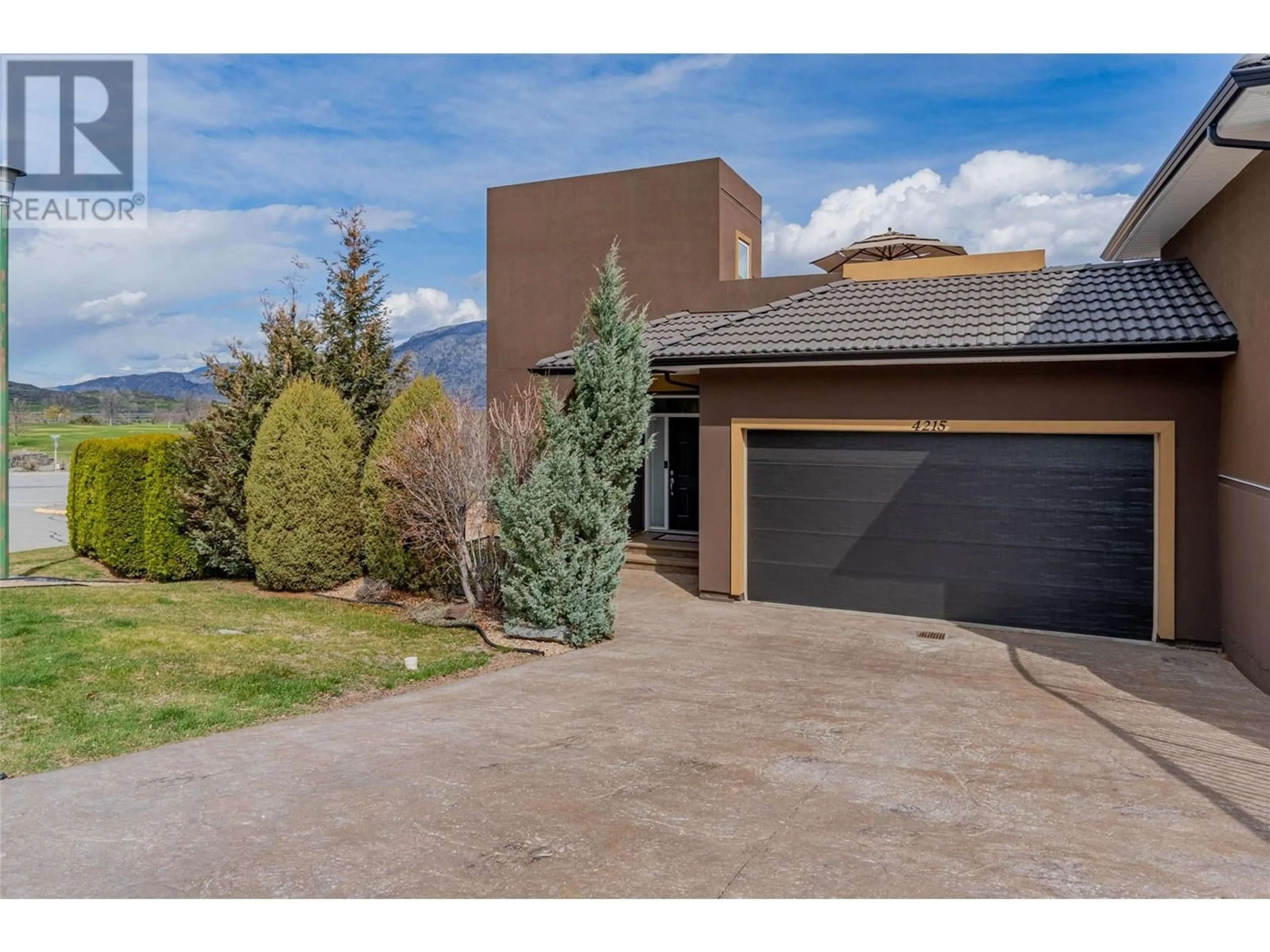 A pic from outside/outdoor area/front of a property/back of a property/a pic from drone, street for 4215 PEBBLE BEACH DRIVE, Osoyoos British Columbia V0H1V3
