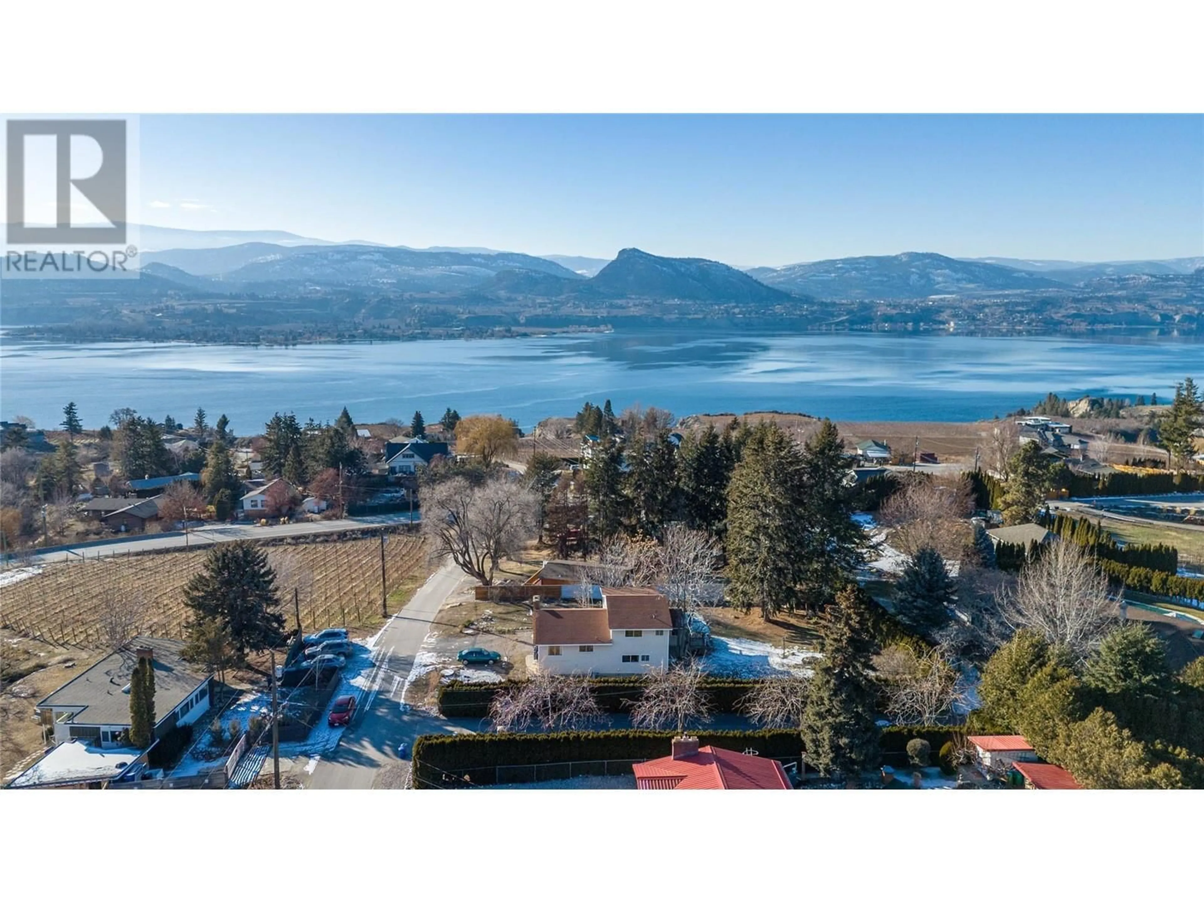 A pic from outside/outdoor area/front of a property/back of a property/a pic from drone, water/lake/river/ocean view for 1145 MCPHEE ROAD, Naramata British Columbia V0H1N0