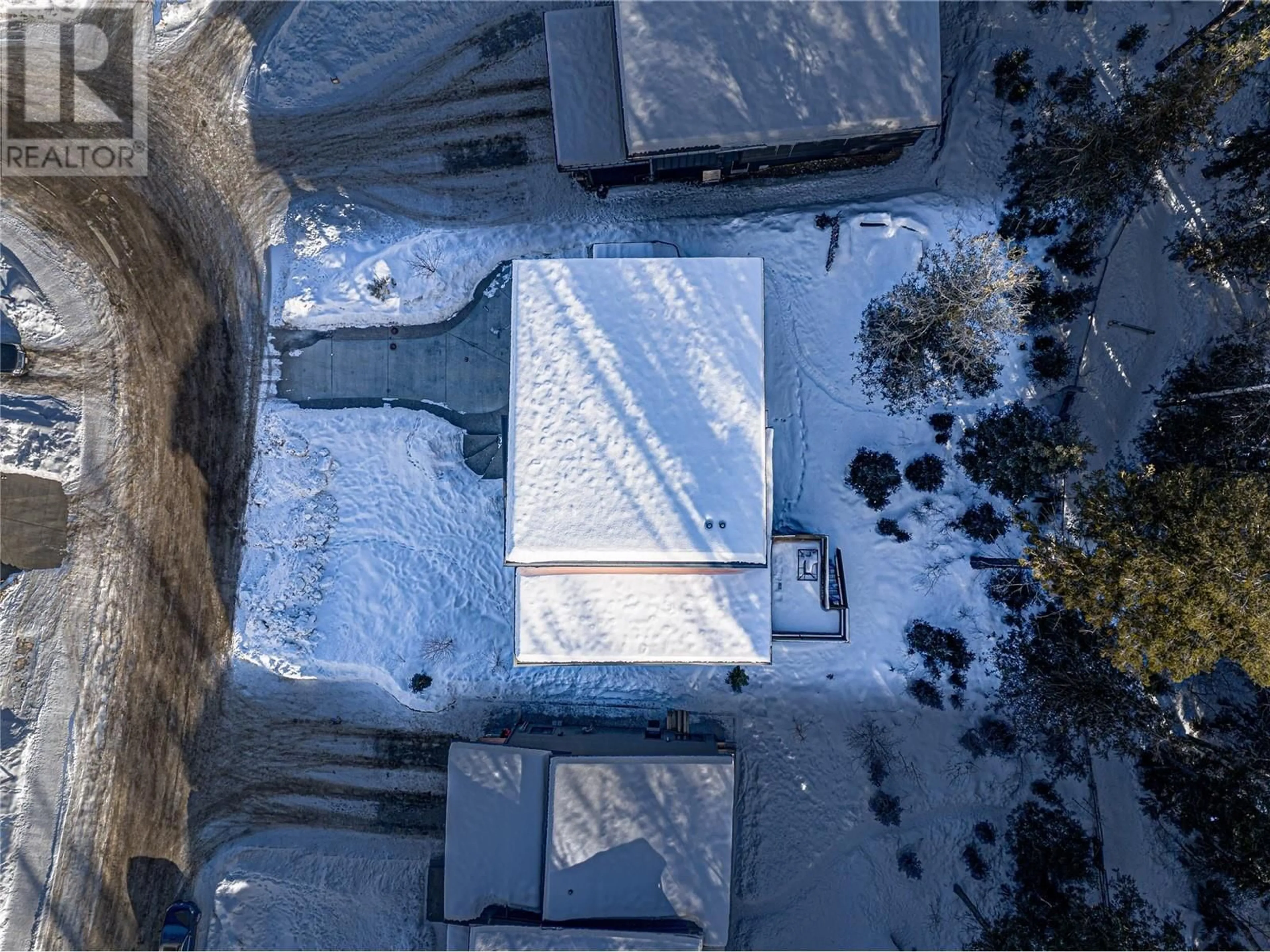 A pic from outside/outdoor area/front of a property/back of a property/a pic from drone, street for 43 Piedmont Drive, Fernie British Columbia V0B1M4