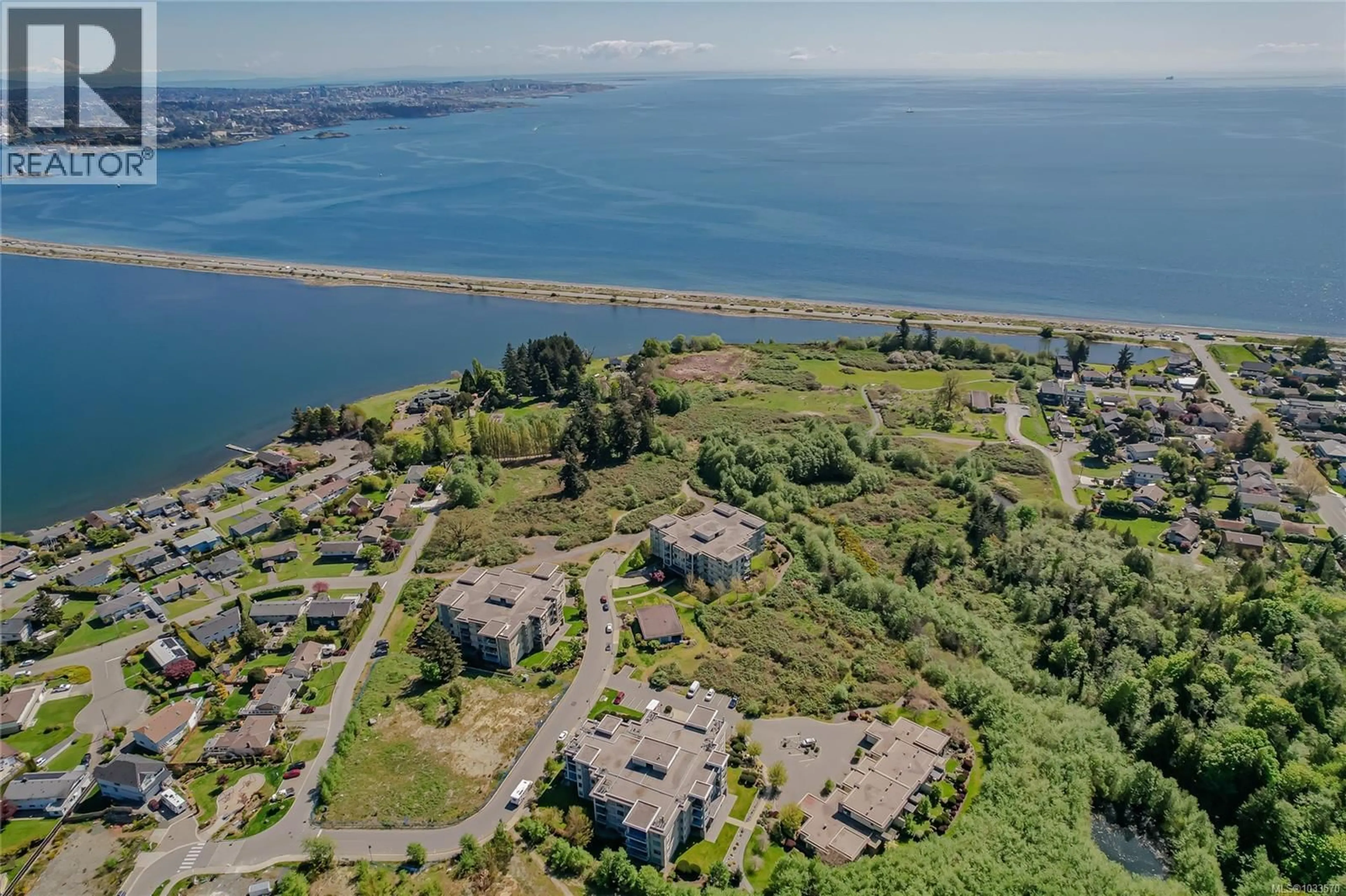 A pic from outside/outdoor area/front of a property/back of a property/a pic from drone, water/lake/river/ocean view for 405 - 3223 SELLECK WAY, Colwood British Columbia V9C3M8