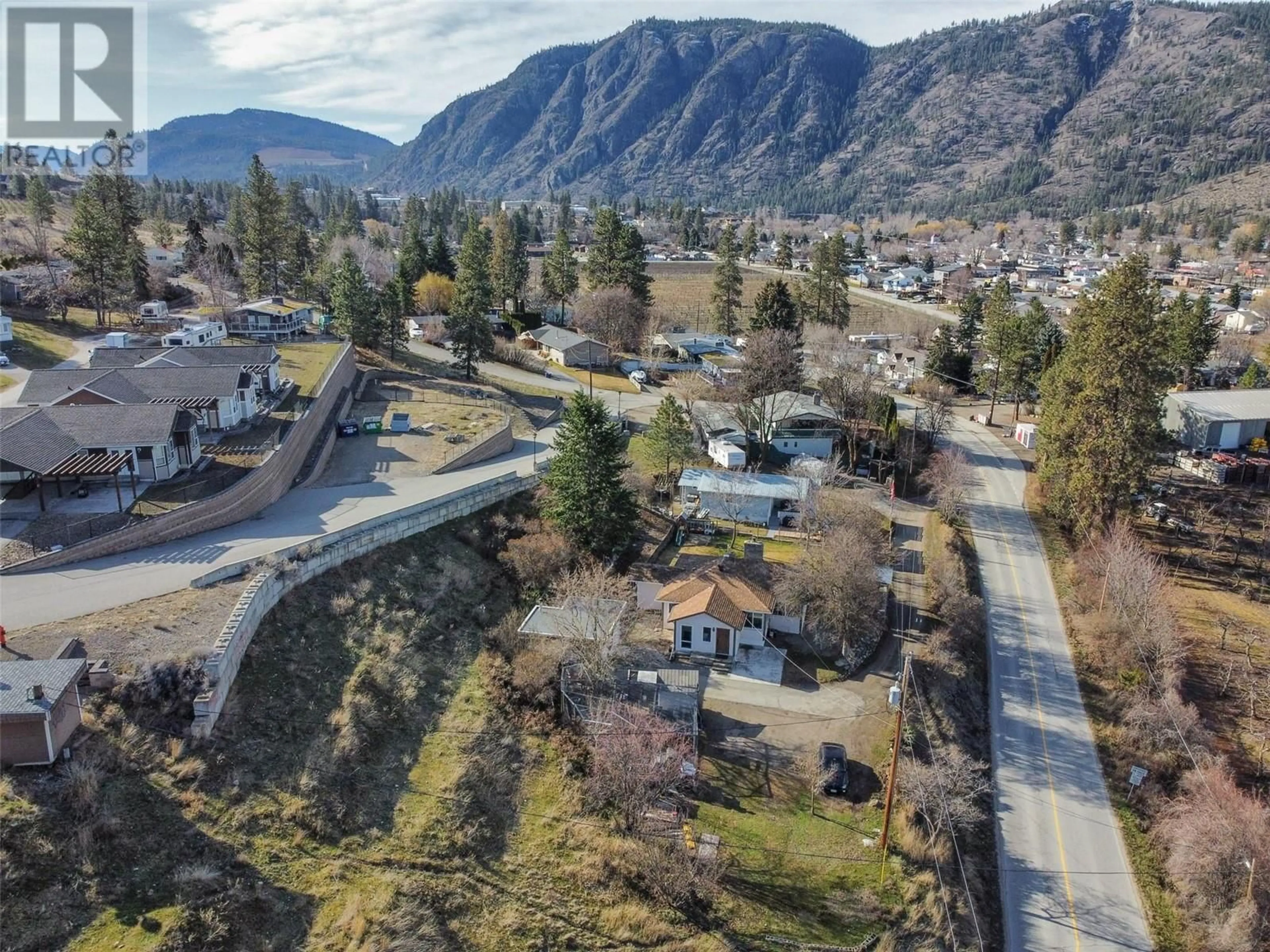 A pic from outside/outdoor area/front of a property/back of a property/a pic from drone, mountain view for 541 Eastside Road, Okanagan Falls British Columbia V0H1R5